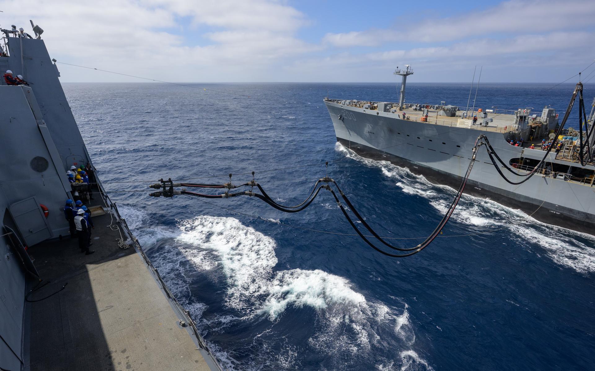 The USNS Guadalupe (T-AO 200) replenishment oiler prepares to refuel USS John P. Murtha (LPD 26) as NASA, U.S. Navy, and U.S. Air Force teams head into the Pacific Ocean for the return of the Artemis II crewmembers to Earth, Monday, April 6, 2026, in the Pacific Ocean off the coast of California. NASA’s Artemis II mission is taking NASA astronauts Reid Wiseman, commander; Victor Glover, pilot; Christina Koch, mission specialist; and CSA (Canadian Space Agency) astronaut Jeremy Hansen, mission specialist on a 10-day journey around the Moon and back aboard their Orion spacecraft. Wiseman, Glover, Koch, and Hansen are scheduled to splash down off the coast of San Diego at approximately 5:07 p.m. PDT (8:07 p.m. EDT) on Friday, April 10.  Photo Credit: (NASA/Bill Ingalls)
