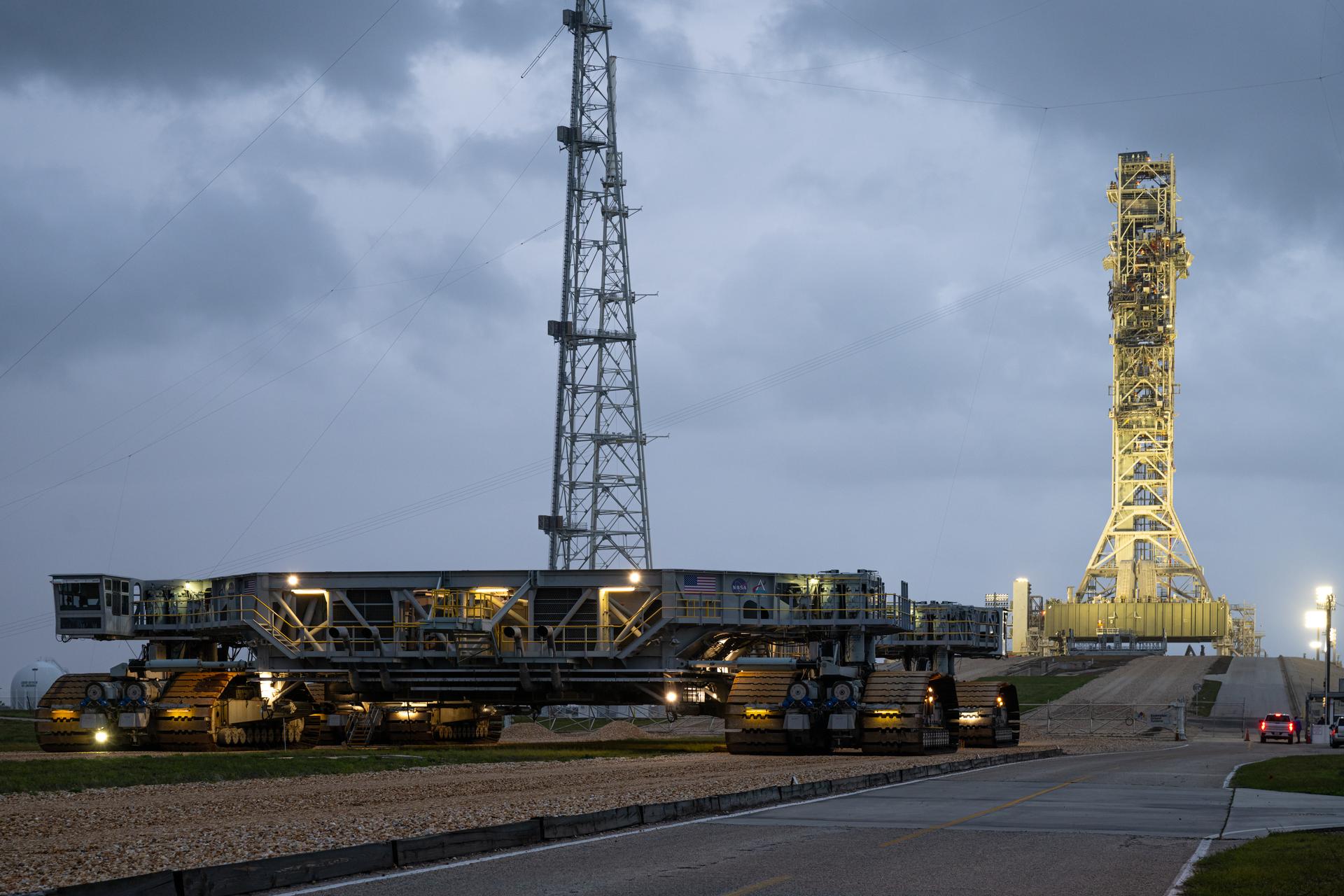 Crawler Transporter 2 is seen outside the gate of Launch Complex 39B, Wednesday, Apr. 8, 2026, at NASA’s Kennedy Space Center in Florida. Photo Credit: (NASA/John Kraus)