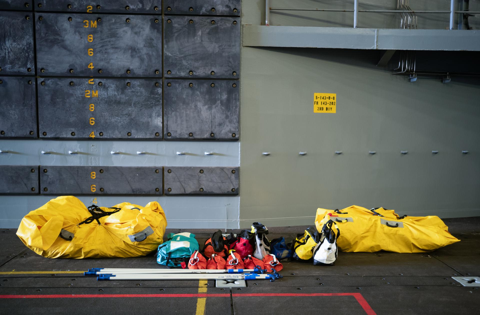 The stability collar, front porch, and other equipment for securing NASA’s Orion spacecraft and facilitating the extraction of the Artemis II crewmembers are seen in the well deck of USS John P. Murtha as NASA and the U.S. military prepare for recovery operations, Thursday, April 9, 2026, in the Pacific Ocean off the coast of California. NASA’s Artemis II mission is taking NASA astronauts Reid Wiseman, commander; Victor Glover, pilot; Christina Koch, mission specialist; and CSA (Canadian Space Agency) astronaut Jeremy Hansen, mission specialist on a 10-day journey around the Moon and back aboard their Orion spacecraft. Wiseman, Glover, Koch, and Hansen are scheduled to splash down off the coast of San Diego at approximately 5:07 p.m. PDT (8:07 p.m. EDT) on Friday, April 10.  Photo Credit: (NASA/Joel Kowsky)