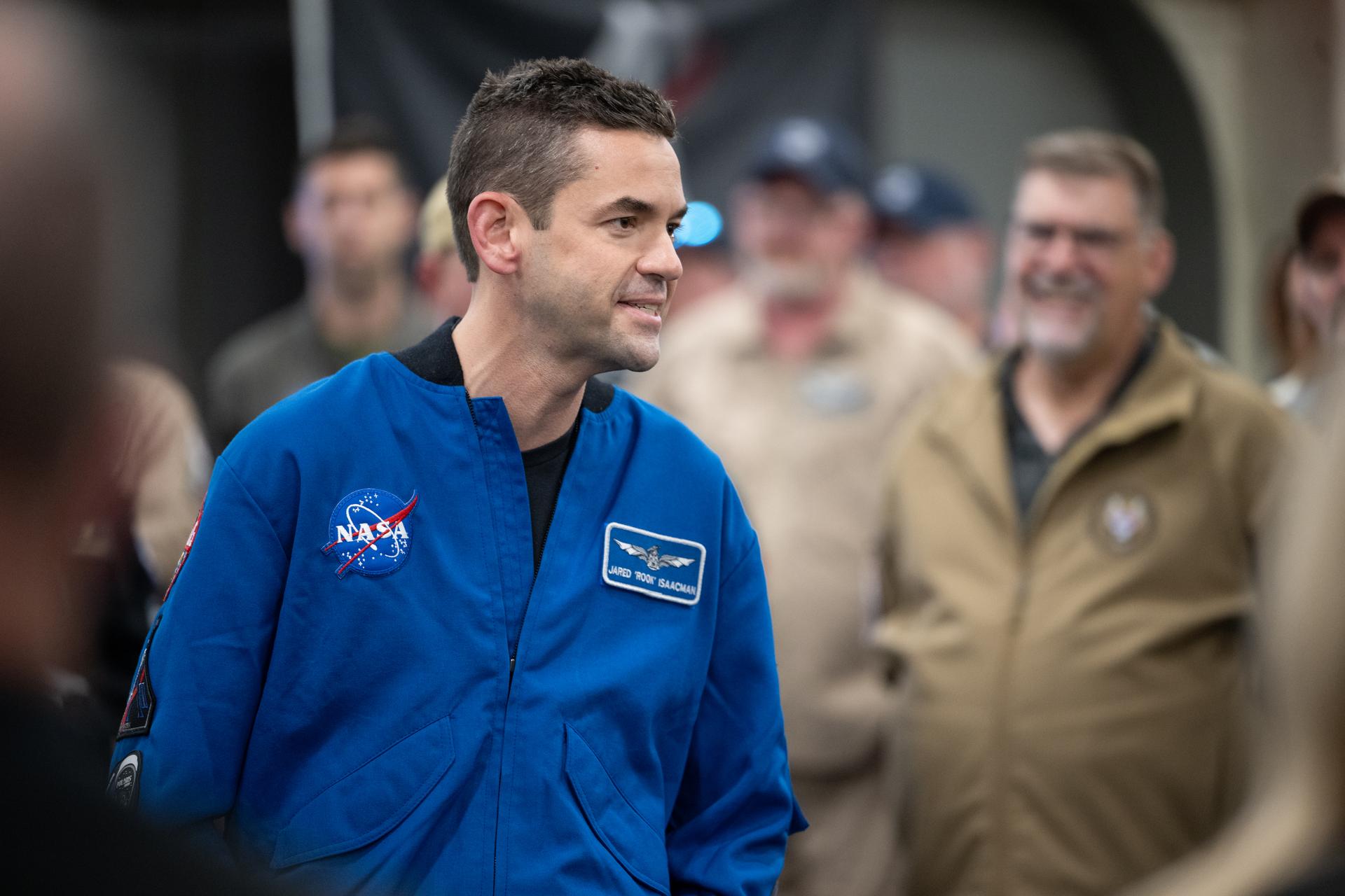 NASA Administrator Jared Isaacman speaks to NASA and U.S. military recovery team members onboard USS John P. Murtha as they prepare for the return of NASA’s Orion spacecraft with Artemis II crewmembers NASA astronauts Reid Wiseman, commander; Victor Glover, pilot; Christina Koch, mission specialist; and CSA (Canadian Space Agency) astronaut Jeremy Hansen, mission specialist aboard in the Pacific Ocean off the coast of California, Friday, April 10, 2026. NASA’s Artemis II mission took Wiseman, Glover, Koch, and Hansen on a nearly 10-day journey around the Moon and back to Earth. The quartet splashed down in the Pacific Ocean at 5:07 p.m. PDT (8:07 p.m. EDT). Photo Credit: (NASA/Joel Kowsky)
