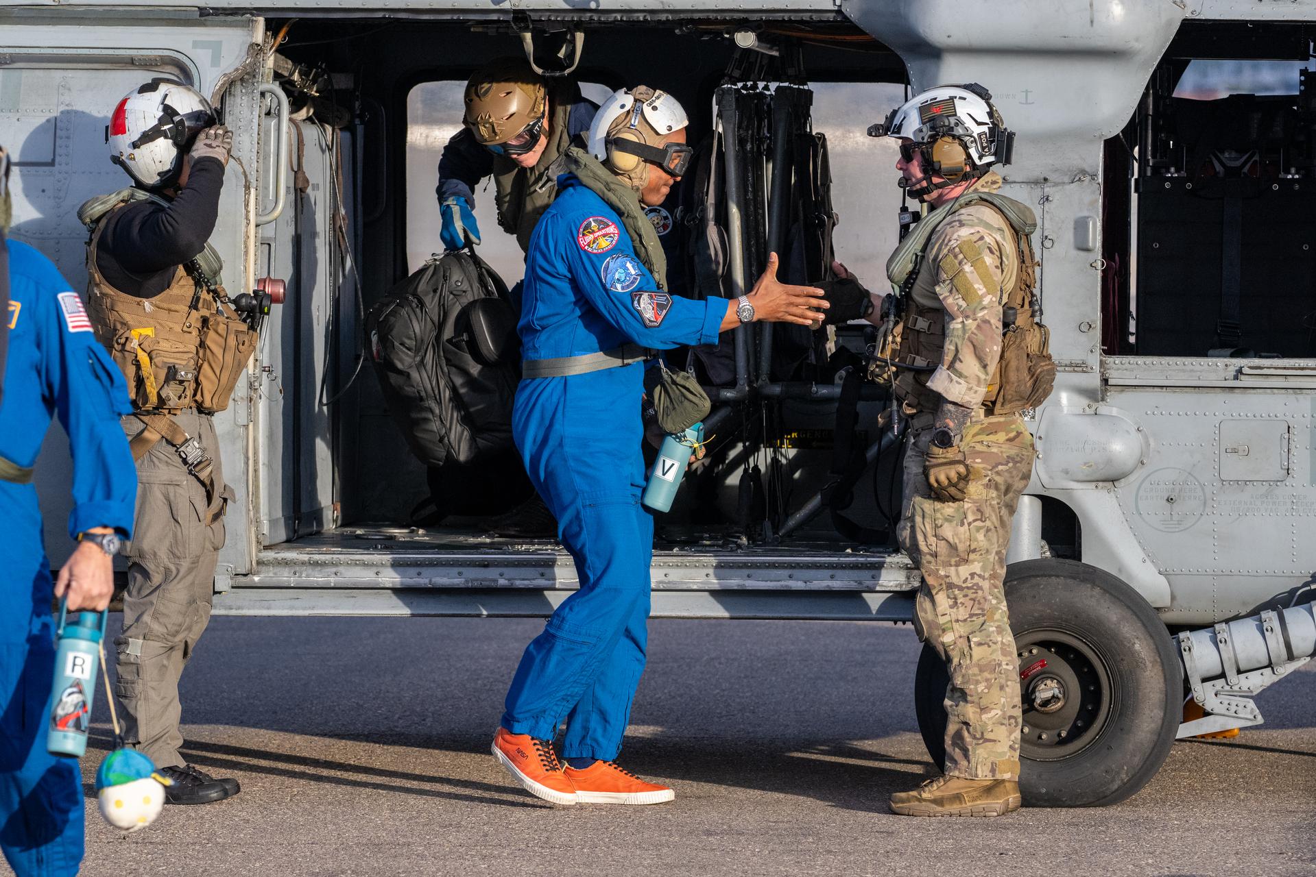 Artemis II NASA astronaut Victor Glover, pilot, is seen after being flown from USS John P. Murtha to Naval Air Station North Island on Navy MH-60 Seahawks from Helicopter Sea Combat Squadron (HSC) 23, Saturday, April 11, 2026, following a splashdown in the Pacific Ocean off the coast of California at 5:07 p.m. PDT (8:07 p.m. EDT) on April 10. NASA’s Artemis II mission took NASA astronauts Reid Wiseman, commander; Victor Glover, pilot; Christina Koch, mission specialist; and CSA (Canadian Space Agency) astronaut Jeremy Hansen, mission specialist on a nearly ten day journey around the Moon and back to Earth. Photo Credit: (NASA/Keegan Barber)