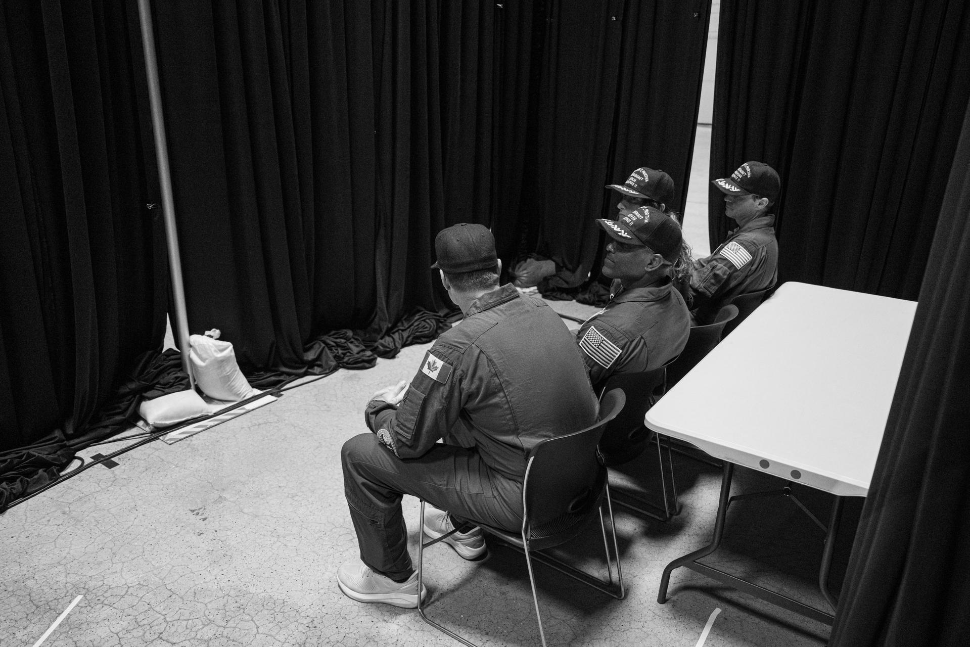 The Artemis II crew of Mission Specialist Jeremy Hansen from the CSA (Canadian Space Agency) and Pilot Victor Glover, Mission Specialist Christina Koch, and Commander Reid Wiseman from NASA are seen backstage during a crew return event, Saturday, Apr. 11, 2026, at Ellington Field in Houston, Texas. NASA’s Artemis II test flight took Commander Reid Wiseman, Pilot Victor Glover, and Mission Specialist Christina Koch from NASA, and Mission Specialist Jeremy Hansen from the CSA (Canadian Space Agency) on an approximately nine-day mission around the Moon and back to Earth. Photo Credit: (NASA/John Kraus)
