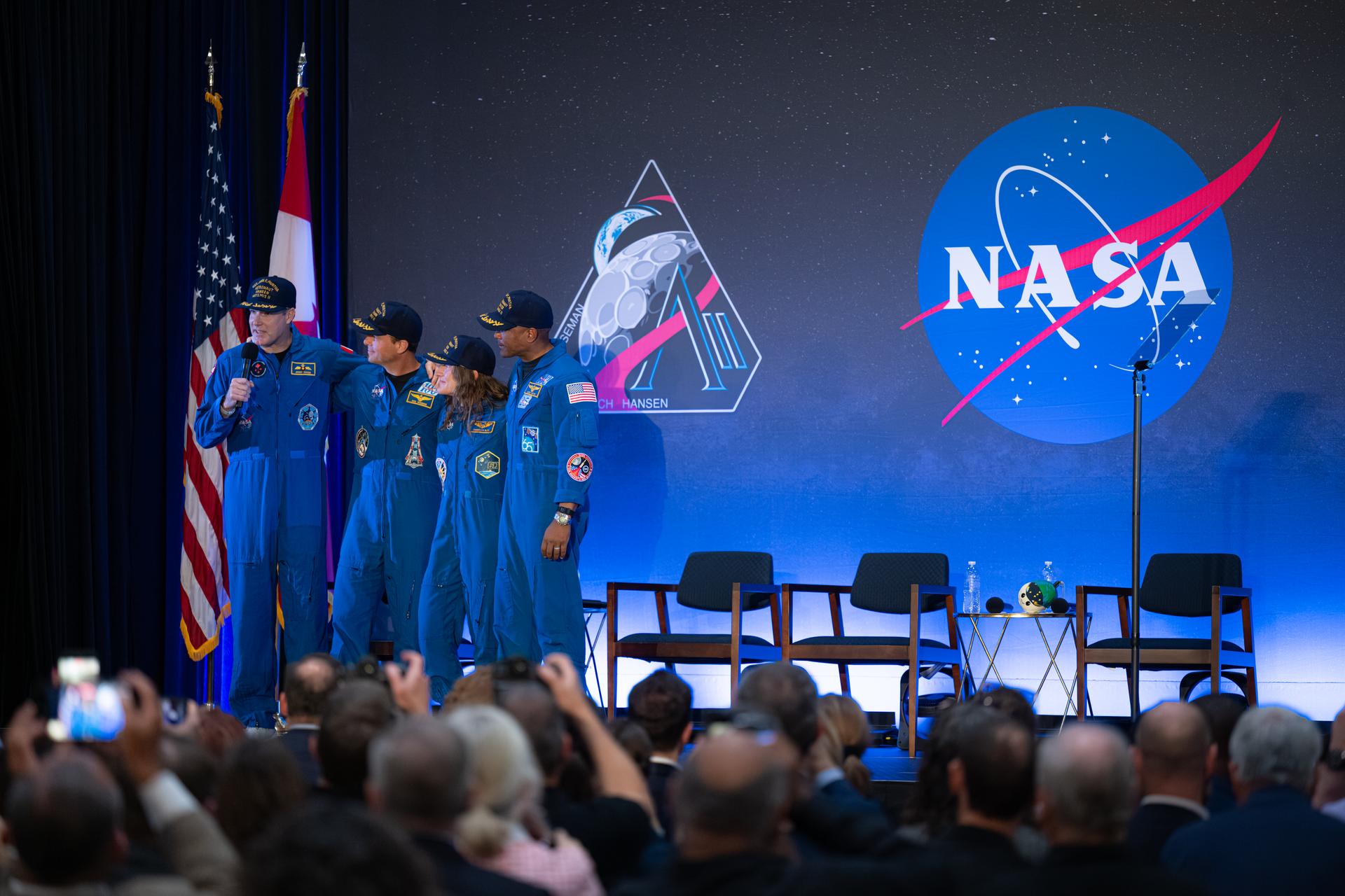 The Artemis II crew of Mission Specialist Jeremy Hansen from the CSA (Canadian Space Agency) and Commander Reid Wiseman, Mission Specialist Christina Koch, and Pilot Victor Glover from NASA are seen during a crew return event, Saturday, Apr. 11, 2026, at Ellington Field in Houston, Texas. NASA’s Artemis II test flight took Commander Reid Wiseman, Pilot Victor Glover, and Mission Specialist Christina Koch from NASA, and Mission Specialist Jeremy Hansen from the CSA (Canadian Space Agency) on an approximately nine-day mission around the Moon and back to Earth. Photo Credit: (NASA/John Kraus)