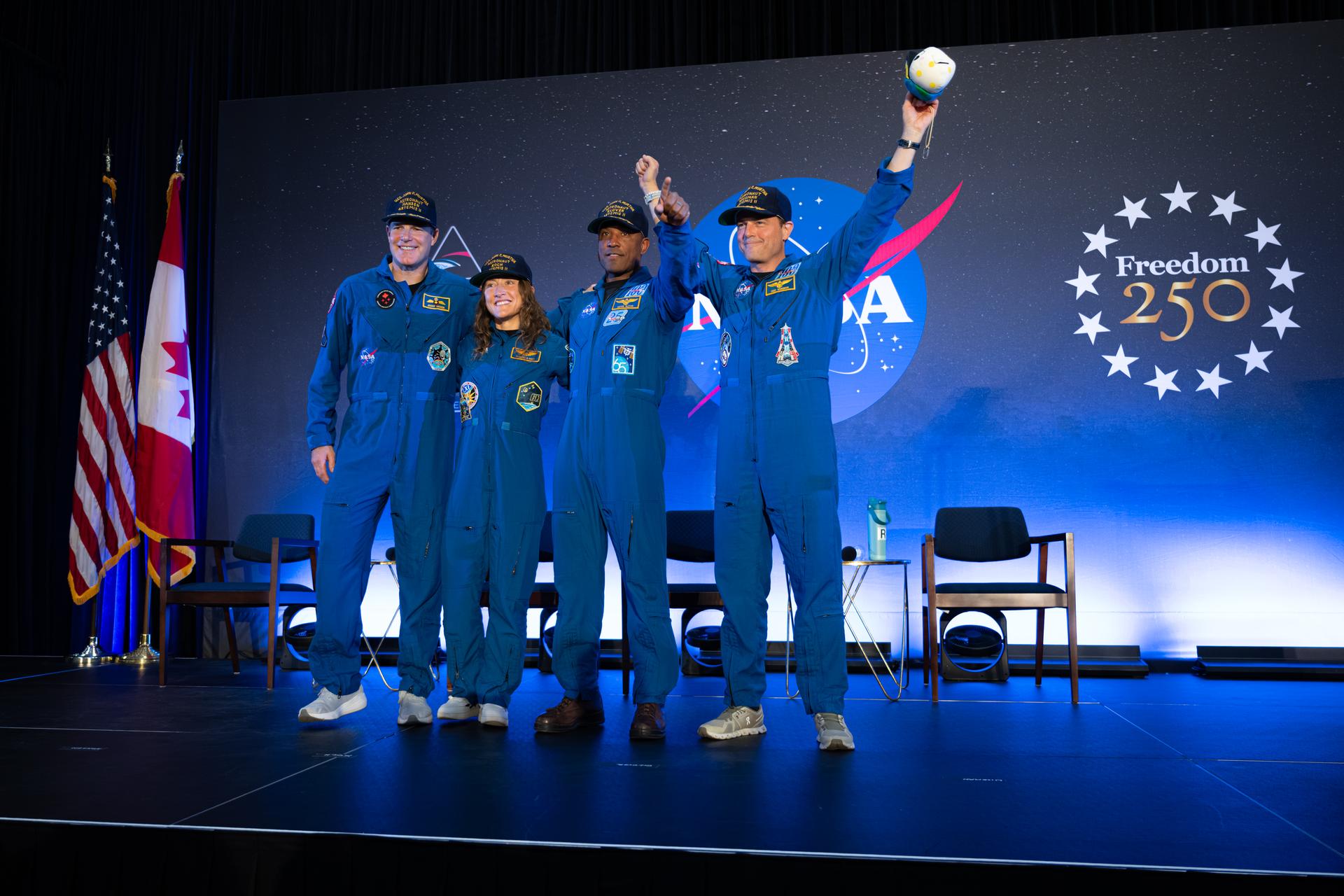 The Artemis II crew of Mission Specialist Jeremy Hansen from the CSA (Canadian Space Agency) and Mission Specialist Christina Koch, Pilot Victor Glover, and Commander Reid Wiseman from NASA are seen during a crew return event, Saturday, Apr. 11, 2026, at Ellington Field in Houston, Texas. NASA’s Artemis II test flight took Commander Reid Wiseman, Pilot Victor Glover, and Mission Specialist Christina Koch from NASA, and Mission Specialist Jeremy Hansen from the CSA (Canadian Space Agency) on an approximately nine-day mission around the Moon and back to Earth. Photo Credit: (NASA/John Kraus)