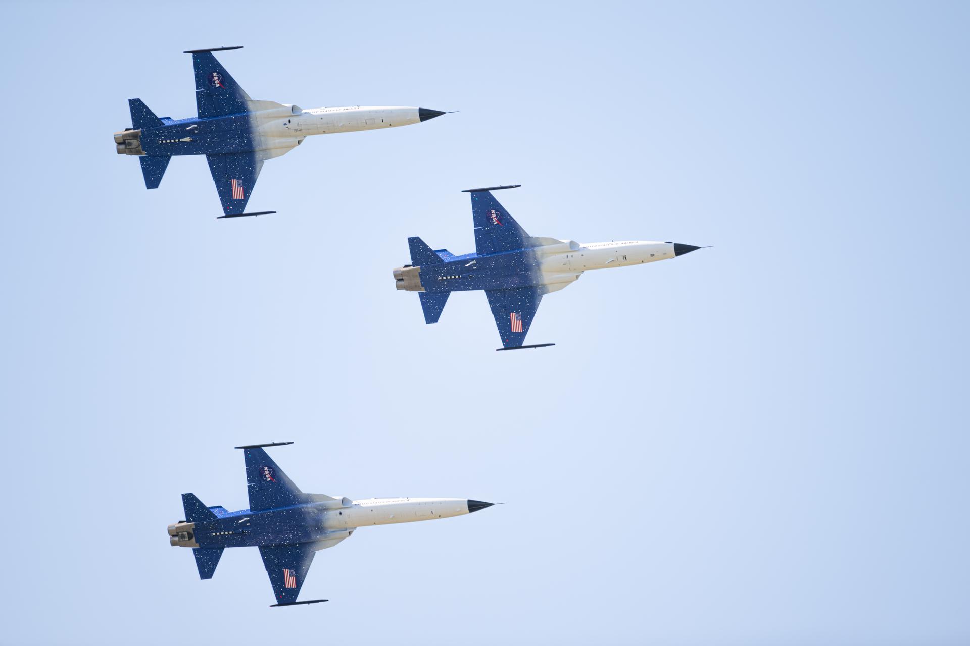 NASA Administrator Jared Isaacman participates in a formation flight with his F-5 aircraft during an air show performance at the SUN ’n FUN Aerospace Expo, Wednesday, Apr. 15, 2026, in Lakeland, Fla. Isaacman was joined by pilots Sean Gustafson, senior advisor to the administrator, and Jerry Kerby. Photo Credit: (NASA/John Kraus)
