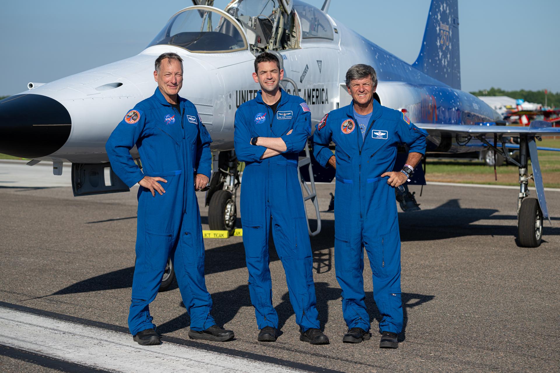 NASA Administrator Jared Isaacman, center; Sean Gustafson, senior advisor to the administrator, left; and Jerry Kerby, pilot, right, pose for a photograph following their air show performance at the SUN ’n FUN Aerospace Expo, Wednesday, Apr. 15, 2026, in Lakeland, Fla. Photo Credit: (NASA/John Kraus)