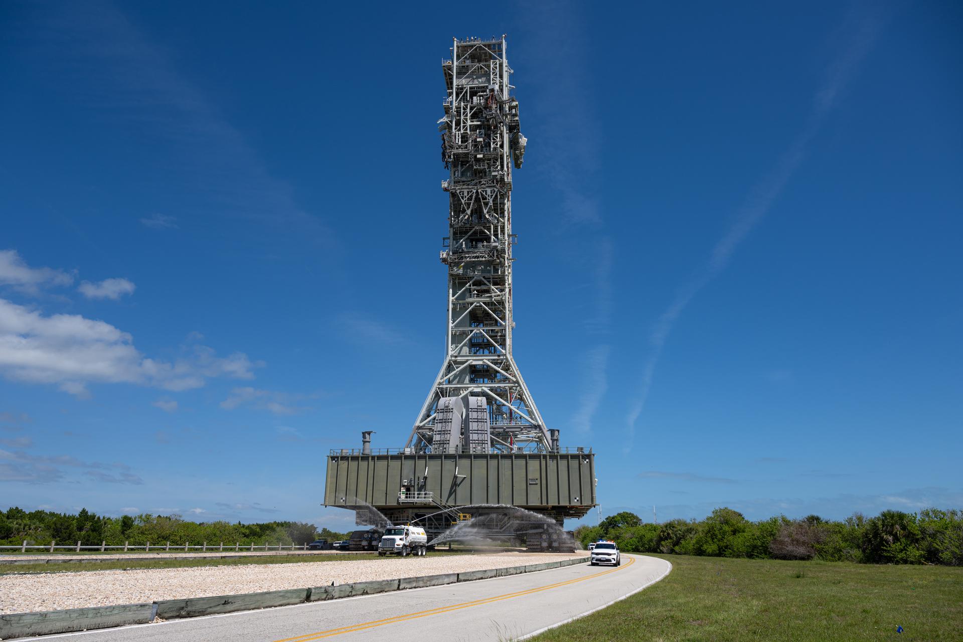 Mobile Launcher 1 is seen returning to the Vehicle Assembly Building, Thursday, Apr. 16, 2026, at NASA’s Kennedy Space Center in Florida. Photo Credit: (NASA/John Kraus)