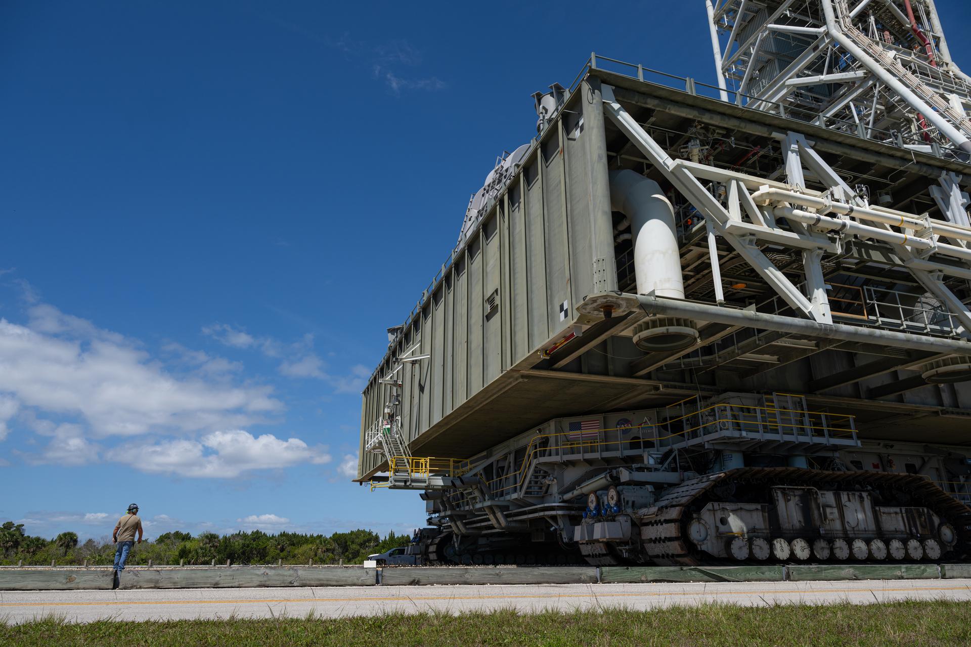 Mobile Launcher 1 is seen returning to the Vehicle Assembly Building, Thursday, Apr. 16, 2026, at NASA’s Kennedy Space Center in Florida. Photo Credit: (NASA/John Kraus)