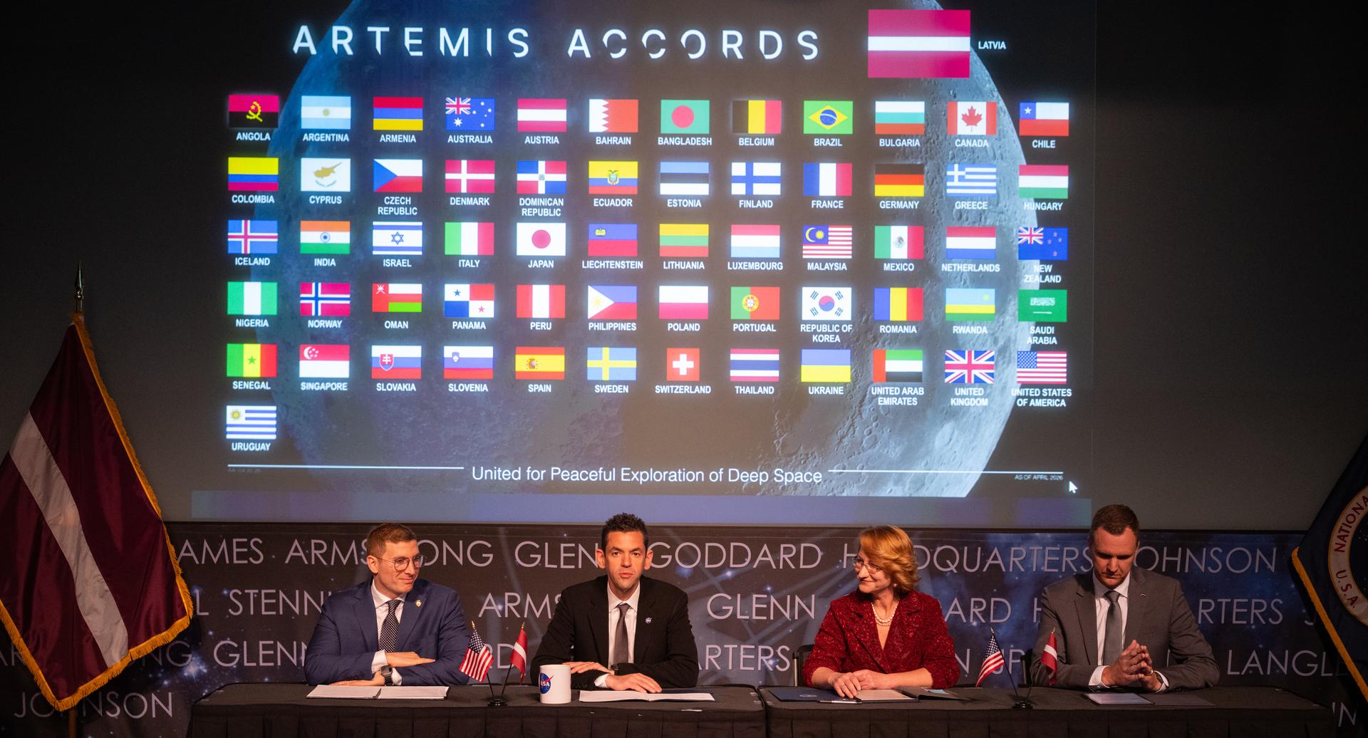 NASA Administrator Jared Isaacman, second from left, delivers remarks during an Artemis Accords signing ceremony alongside Jacob Helberg, U.S. Under Secretary of State for Economic Affairs, left, Dace Melbārde, Latvia’s Minister for Education and Science, second from right, and Jānis Beķeris, Chargé D’Affaires a.i. at the Embassy of the Republic of Latvia to the United States right, Monday, April 20, 2026, at the Mary W. Jackson NASA Headquarters building in Washington. The Republic of Latvia is the 62nd country to sign the Artemis Accords, which establish a practical set of principles to guide space exploration cooperation among nations participating in NASA’s Artemis program.  Photo Credit: (NASA/Joel Kowsky)