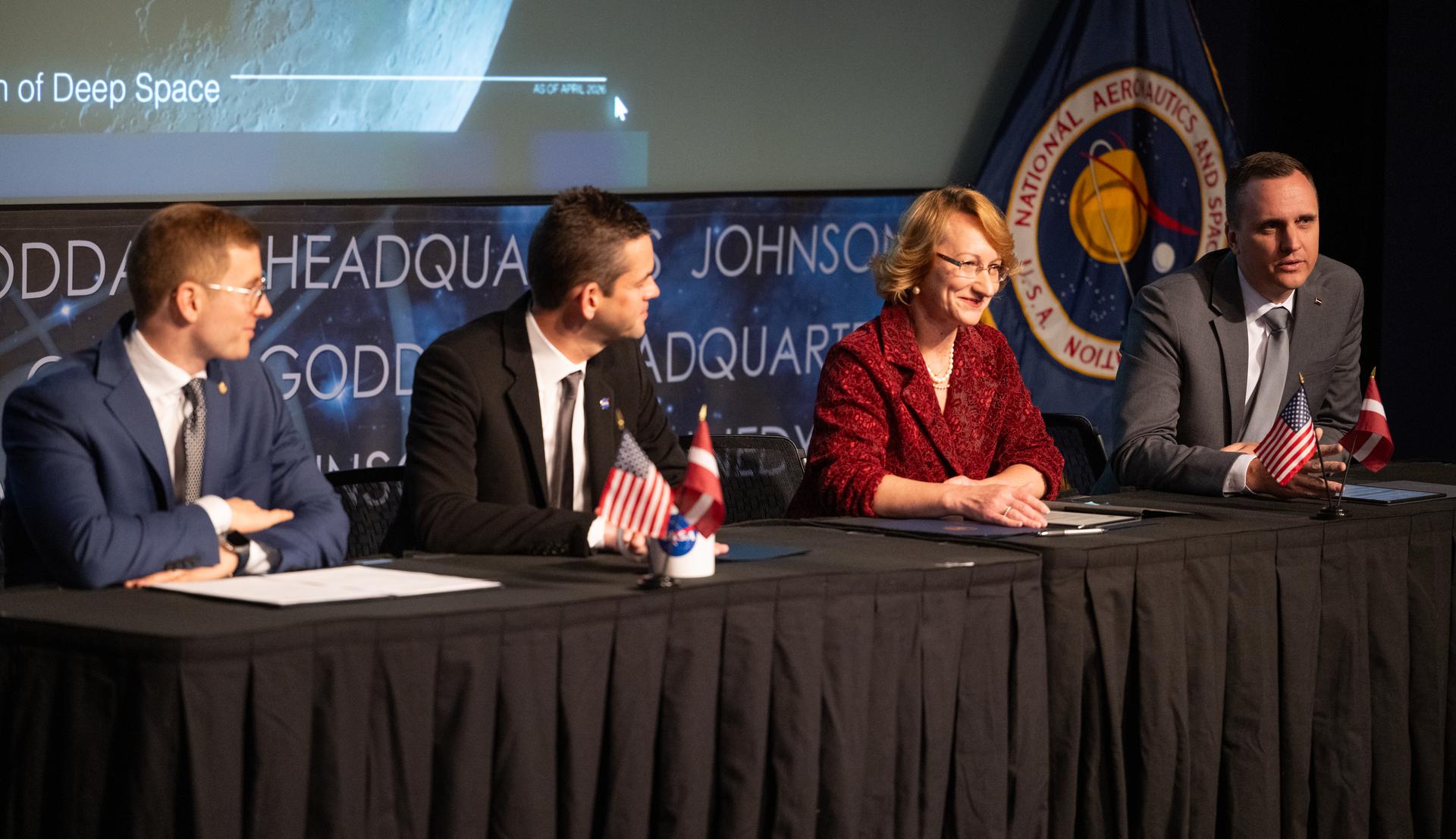 Jānis Beķeris, Chargé D’Affaires a.i. at the Embassy of the Republic of Latvia to the United States, right, delivers remarks during an Artemis Accords signing ceremony alongside Jacob Helberg, U.S. Under Secretary of State for Economic Affairs, left, NASA Administrator Jared Isaacman, second from left, and Dace Melbārde, Latvia’s Minister for Education and Science, second from right, Monday, April 20, 2026, at the Mary W. Jackson NASA Headquarters building in Washington. The Republic of Latvia is the 62nd country to sign the Artemis Accords, which establish a practical set of principles to guide space exploration cooperation among nations participating in NASA’s Artemis program.  Photo Credit: (NASA/Joel Kowsky)
