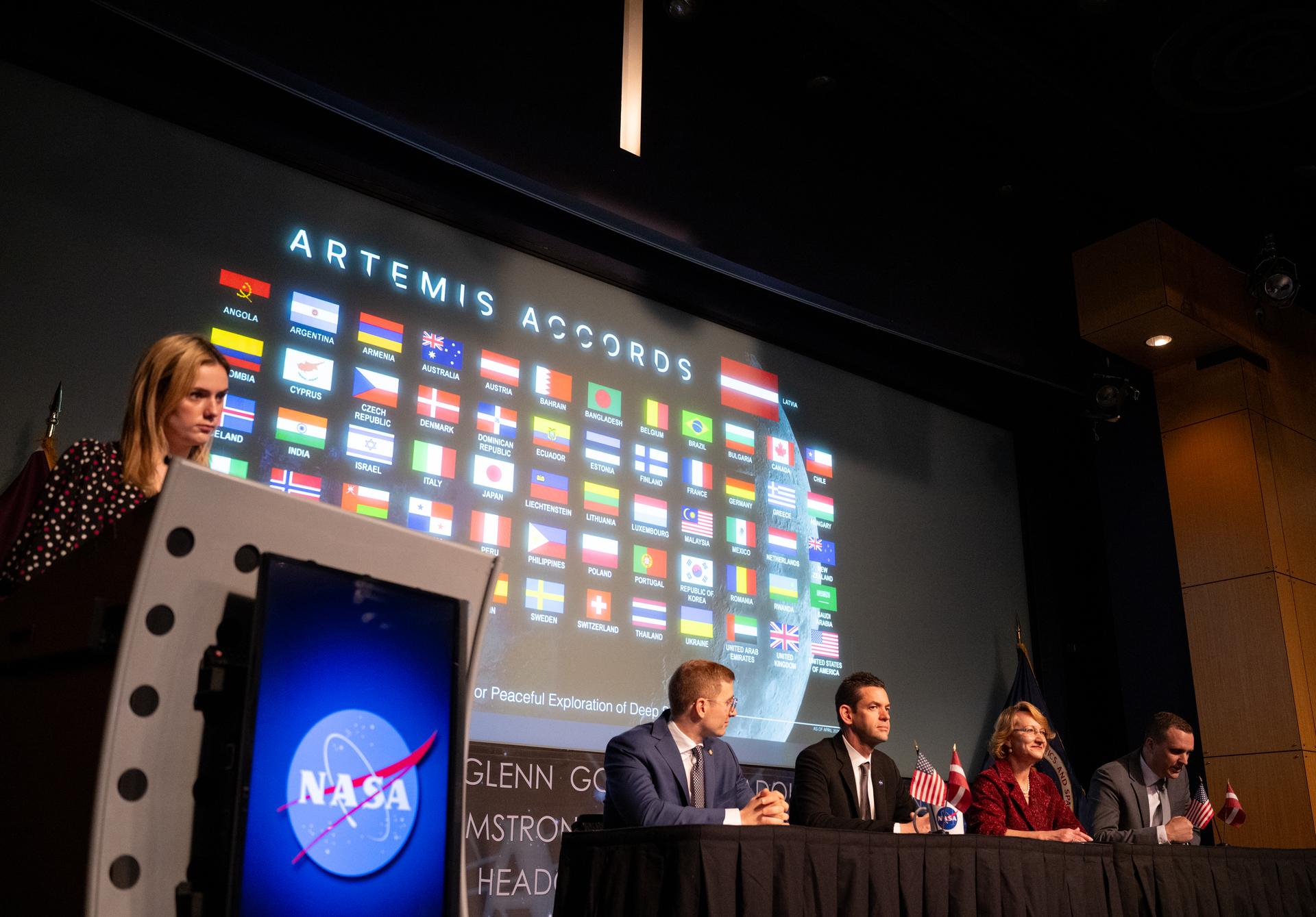 Jānis Beķeris, Chargé D’Affaires a.i. at the Embassy of the Republic of Latvia to the United States, right, delivers remarks during an Artemis Accords signing ceremony alongside Jacob Helberg, U.S. Under Secretary of State for Economic Affairs, left, NASA Administrator Jared Isaacman, second from left, and Dace Melbārde, Latvia’s Minister for Education and Science, second from right, Monday, April 20, 2026, at the Mary W. Jackson NASA Headquarters building in Washington. The Republic of Latvia is the 62nd country to sign the Artemis Accords, which establish a practical set of principles to guide space exploration cooperation among nations participating in NASA’s Artemis program.  Photo Credit: (NASA/Joel Kowsky)