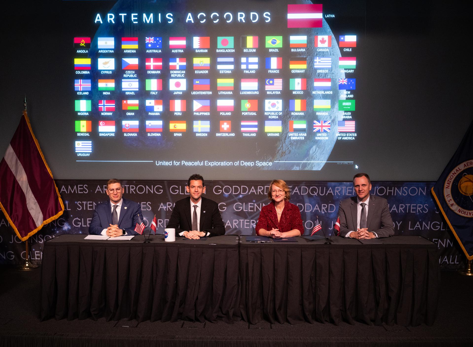 Jacob Helberg, U.S. Under Secretary of State for Economic Affairs, left, NASA Administrator Jared Isaacman, second from left, Dace Melbārde, Latvia’s Minister for Education and Science, second from right, and Jānis Beķeris, Chargé D’Affaires a.i. at the Embassy of the Republic of Latvia to the United States, right, pose for a picture after an Artemis Accords signing ceremony, Monday, April 20, 2026, at the Mary W. Jackson NASA Headquarters building in Washington. The Republic of Latvia is the 62nd country to sign the Artemis Accords, which establish a practical set of principles to guide space exploration cooperation among nations participating in NASA’s Artemis program.  Photo Credit: (NASA/Joel Kowsky)