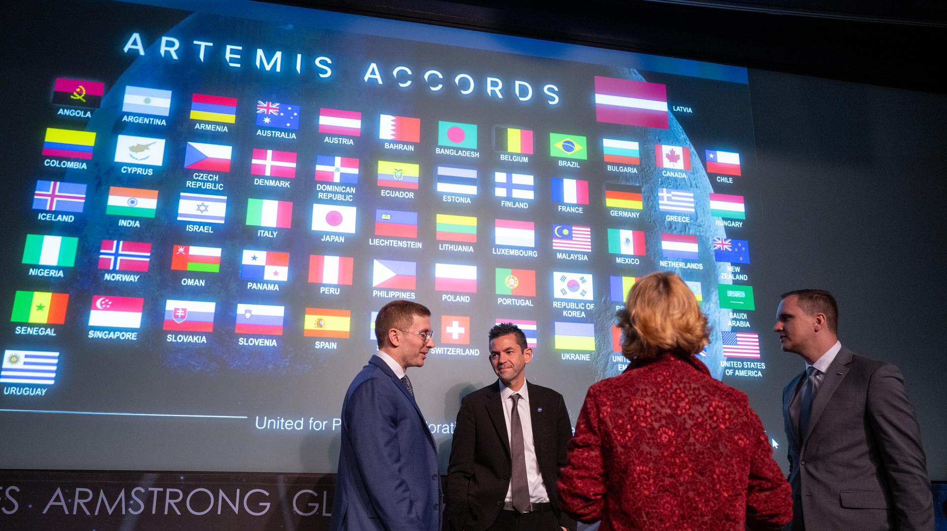 Jacob Helberg, U.S. Under Secretary of State for Economic Affairs, left, NASA Administrator Jared Isaacman, second from left, Dace Melbārde, Latvia’s Minister for Education and Science, second from right, and Jānis Beķeris, Chargé D’Affaires a.i. at the Embassy of the Republic of Latvia to the United States, right, are seen following an Artemis Accords signing ceremony, Monday, April 20, 2026, at the Mary W. Jackson NASA Headquarters building in Washington. The Republic of Latvia is the 62nd country to sign the Artemis Accords, which establish a practical set of principles to guide space exploration cooperation among nations participating in NASA’s Artemis program.  Photo Credit: (NASA/Joel Kowsky)