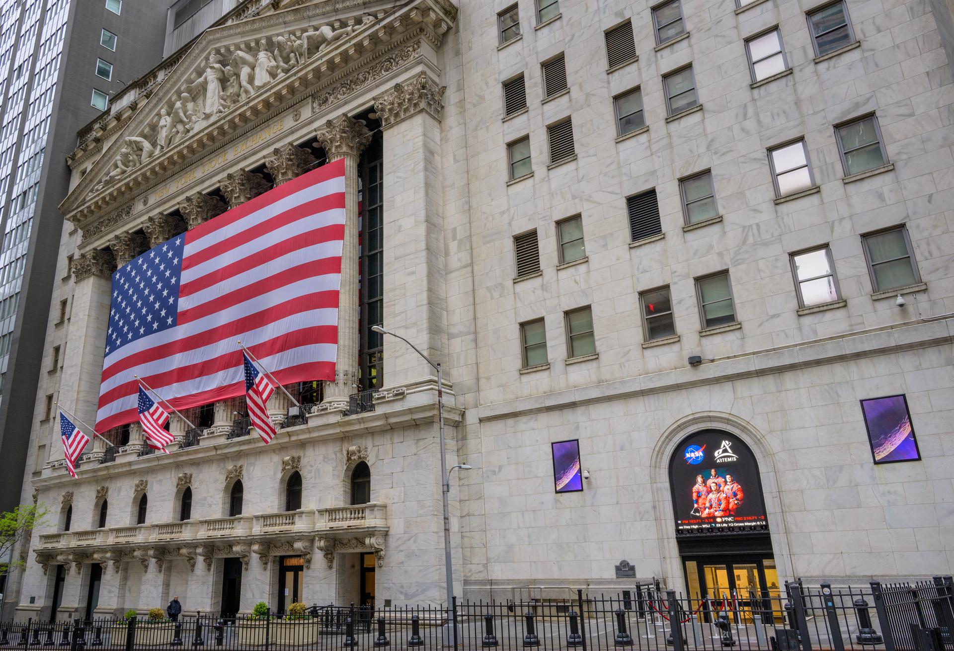 Signage outside the New York Stock Exchange building show Artemis II mission imagery ahead of NASA Administrator Jared Isaacman ringing the opening bell, Thursday, April 30, 2026, in New York, NY. Photo Credit: (NASA/Bill Ingalls)