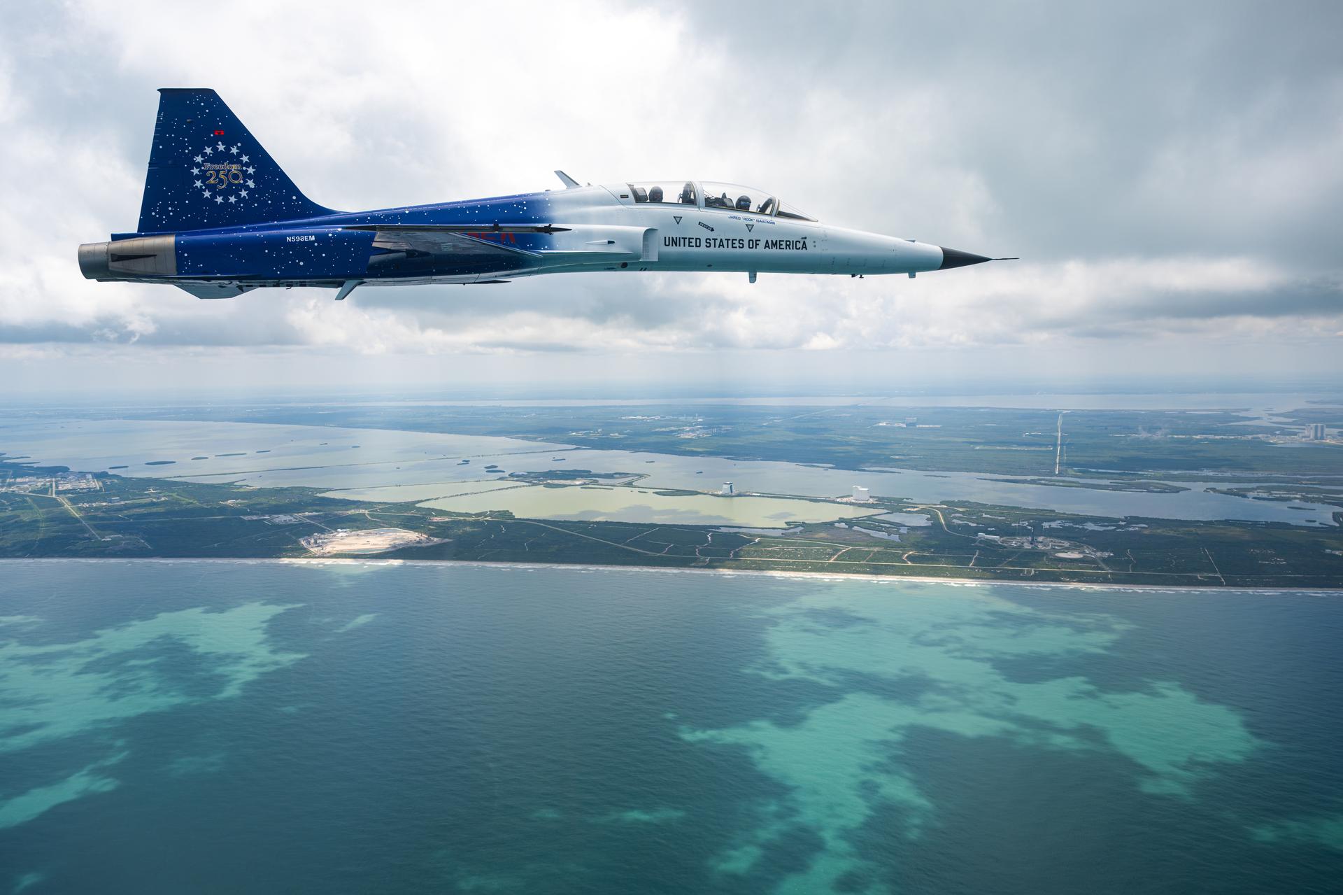 One of NASA Administrator Jared Isaacman’s personal F-5 aircraft is seen during an employee incentive flying event, Wednesday, May 13, 2026, at NASA’s Kennedy Space Center in Florida. Rachel Kraft, Artemis communications lead at NASA Headquarters, was flying in the back seat. Photo Credit: (NASA/John Kraus)