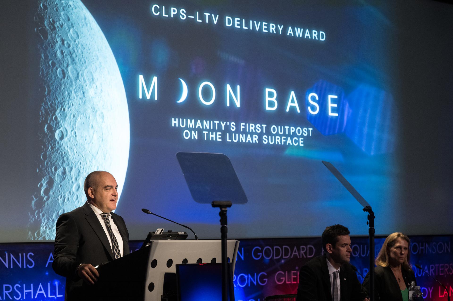 NASA Administrator Jared Isaacman provides remarks during a news conference to discuss Moon Base, a long-term lunar exploration and infrastructure initiative designed to enable sustained human presence and expanded scientific and commercial activity at the lunar South Pole, Tuesday, May 26, 2026, at the Mary W. Jackson NASA Headquarters building in Washington. Photo Credit: (NASA/Aubrey Gemignani)