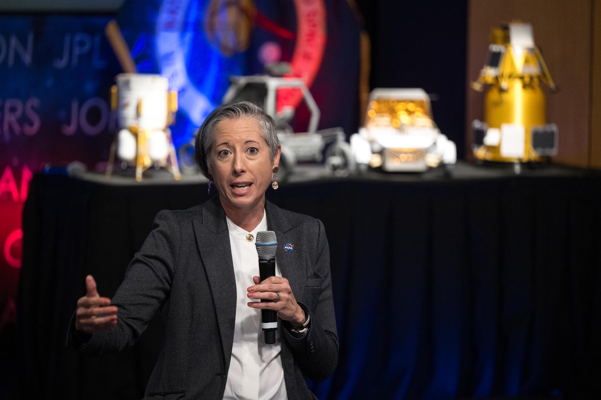 NASA’s Nujoud Merancy responds to a question during a news conference to discuss Moon Base, a long-term lunar exploration and infrastructure initiative designed to enable sustained human presence and expanded scientific and commercial activity at the lunar South Pole, Tuesday, May 26, 2026, at the Mary W. Jackson NASA Headquarters building in Washington. Photo Credit: (NASA/Aubrey Gemignani)