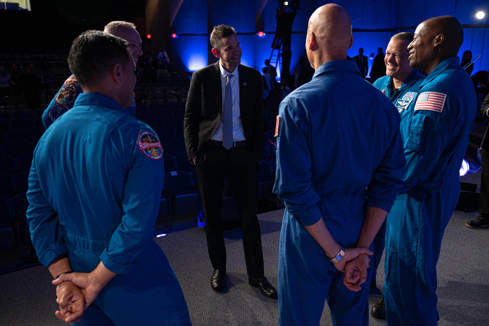 NASA Administrator Jared Isaacman, center, speaks with members of the prime and backup Artemis III crew, Tuesday, June 9, 2026, at NASA’s Johnson Space Center in Houston, Texas. The Artemis III crew consists of, from left to right, NASA astronauts Frank Rubio, mission specialist, and Randy Bresnik, commander; ESA (European Space Agency) astronaut Luca Parmitano, pilot; and NASA astronauts Bob Hines, backup crew member, and Andre Douglas, mission specialist. Photo Credit: (NASA/John Kraus)