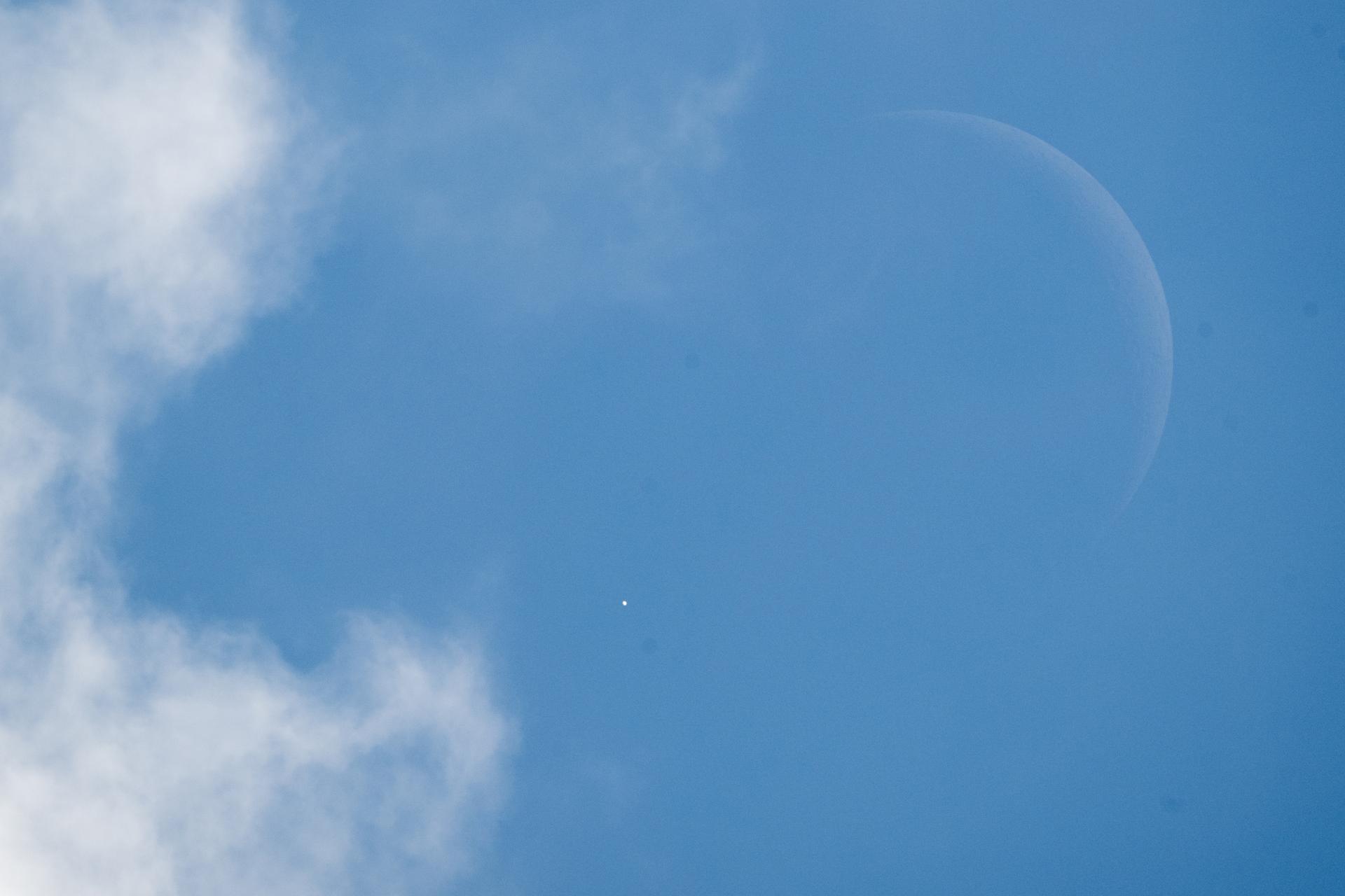Venus is seen as disappears behind the Moon, at the start of occultation, on Wednesday, June 17, 2026, from the Mary W. Jackson NASA Headquarters building in Washington. The Moon occulted, or passed in front of, Venus for the first of three time this year.  Photo Credit: (NASA/Joel Kowsky)