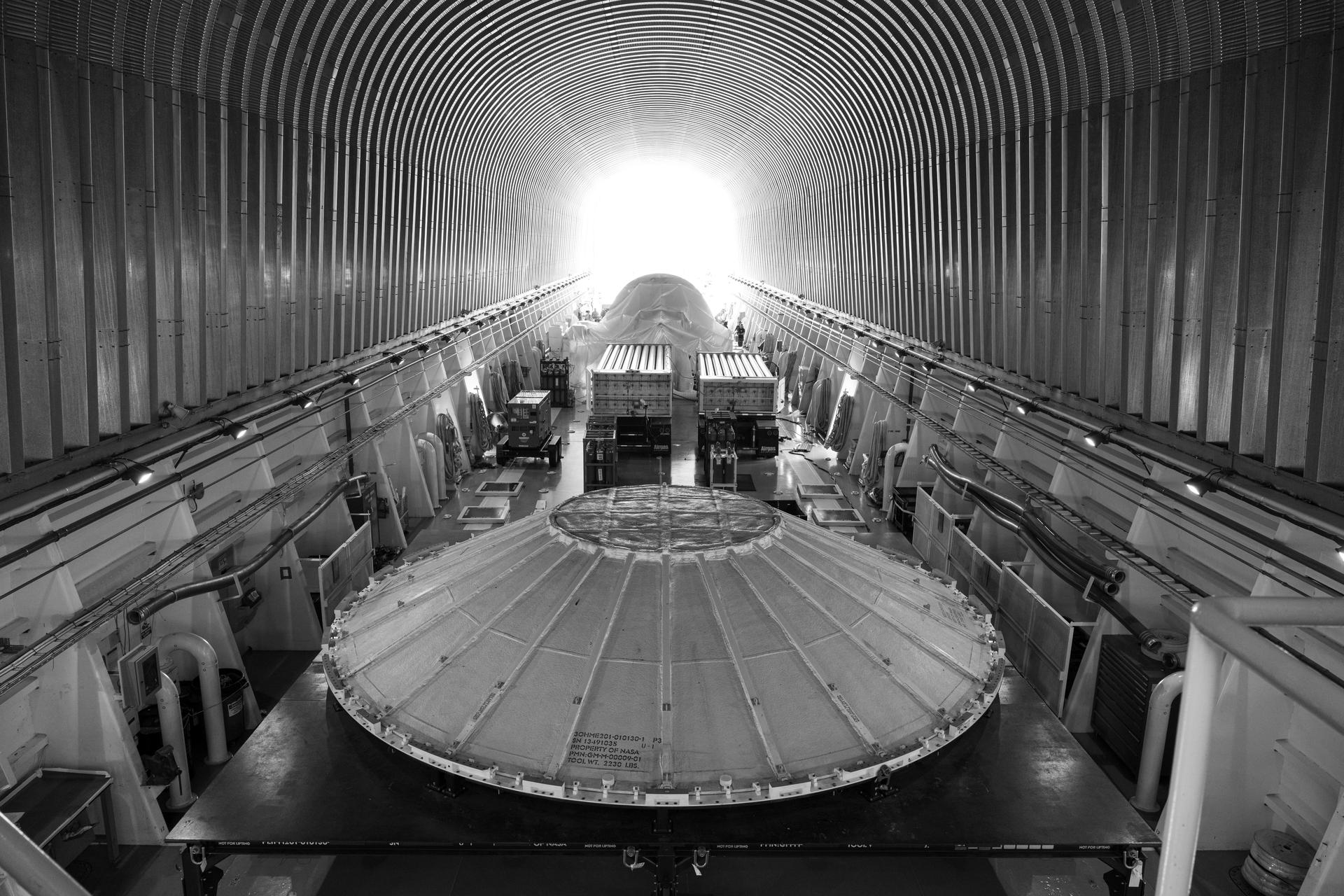 An interior view of NASA’s Pegasus barge, carrying a weather cover for Artemis III SLS (Space Launch System) rocket core stage and NASA’s Nancy Grace Roman Telescope, is seen, Sunday, June 21, at NASA’s Kennedy Space Center in Florida. Photo Credit: (NASA/John Kraus)