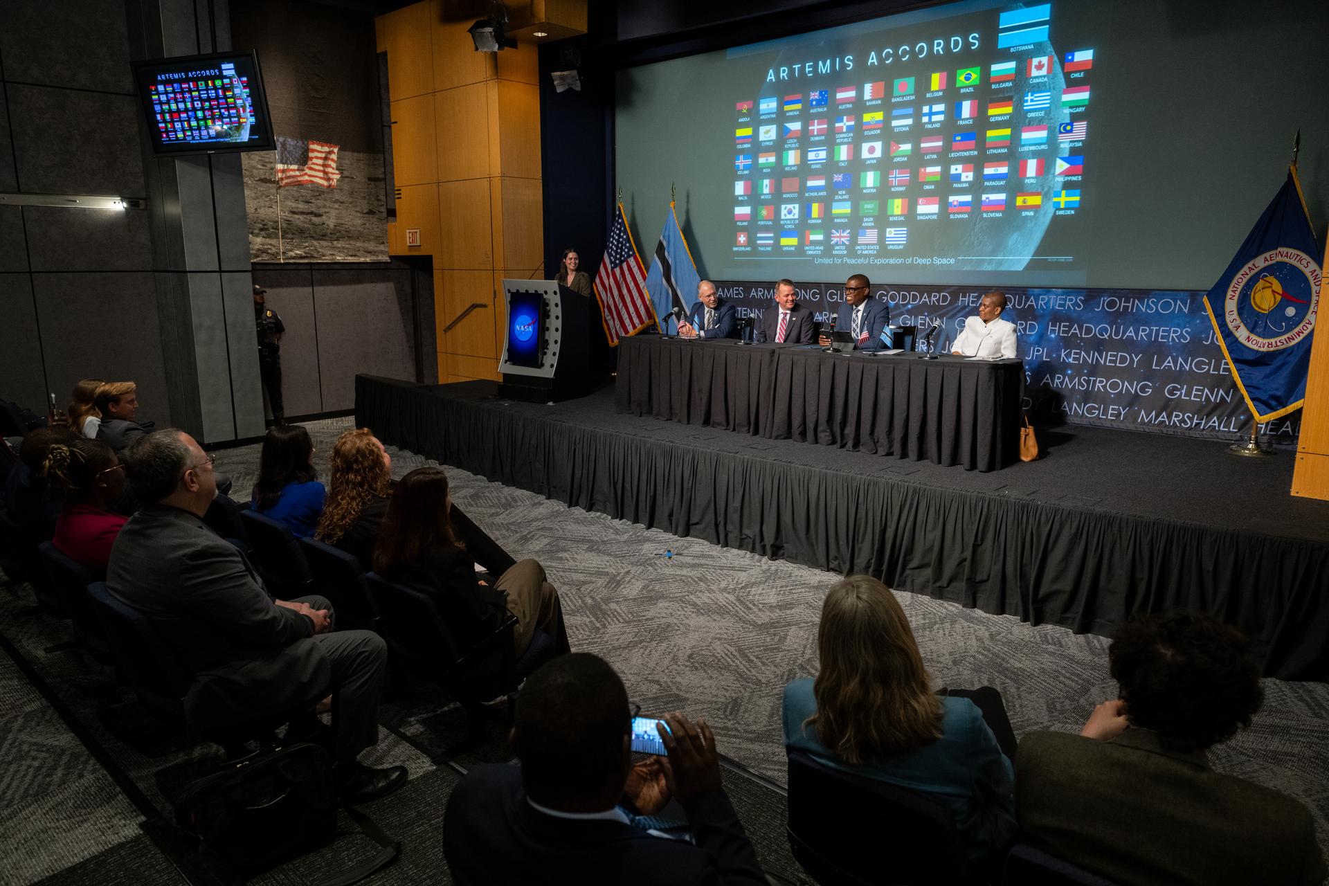 Minister of Communications and Innovation David Tshere, second from right, delivers remarks during an Artemis Accords signing ceremony with the Republic of Botswana alongside Acting Ambassador of the Republic of Botswana to the United States Mabedi Ngwenya, right, Senior Advisor on Space for the Bureau of Oceans and International Environmental and Scientific Affairs Greg Autry, second from left, and NASA Deputy Administrator Matt Anderson, third from right, Thursday, June 25, 2026, at the Mary W. Jackson NASA Headquarters building in Washington. The Republic of Botswana is the 68th country to sign the Artemis Accords, which establish a practical set of principles to guide space exploration cooperation among nations participating in NASA’s Artemis program. Photo Credit: (NASA/Keegan Barber)