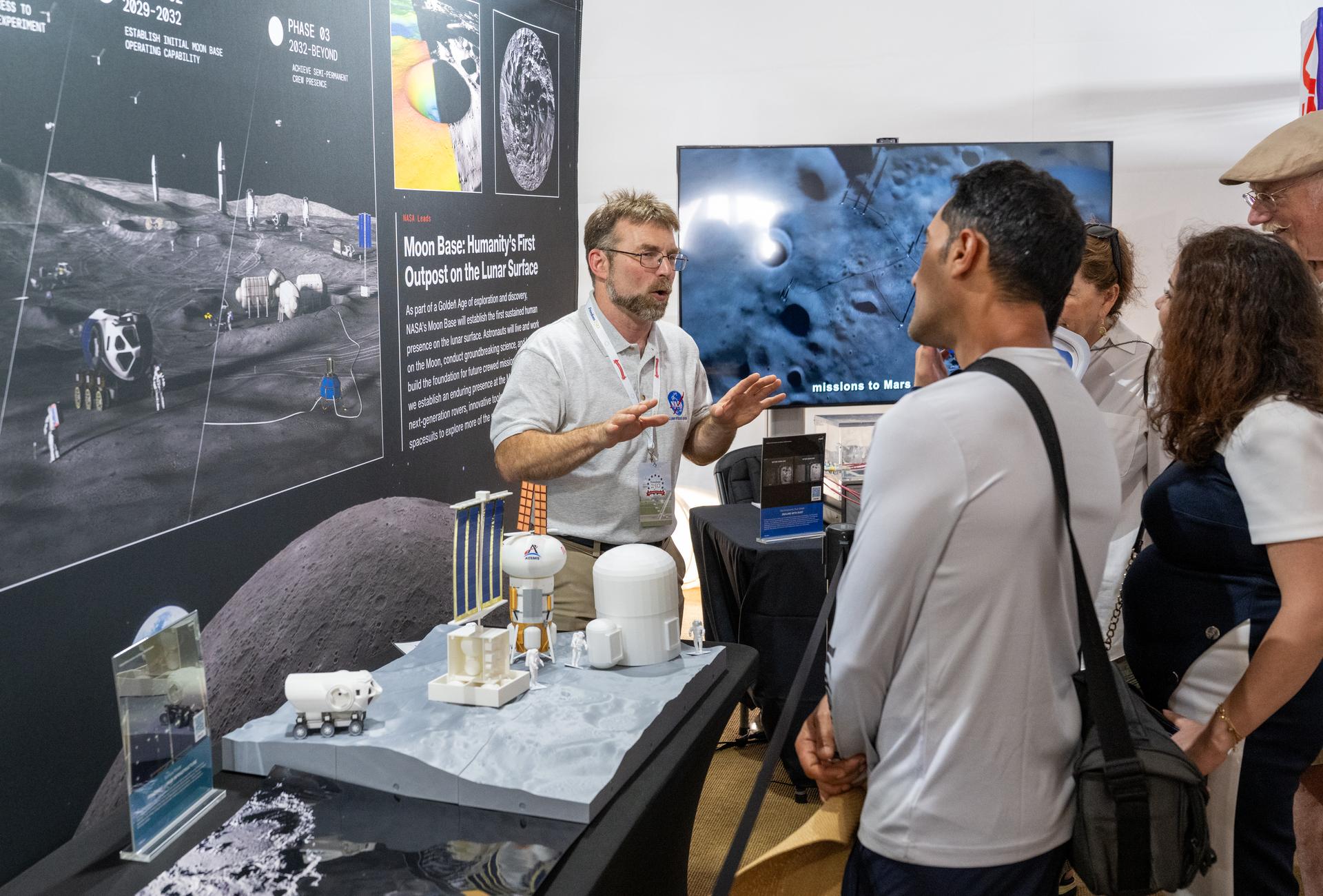 Visitors to the Great American State Fair are seen as they view exhibits in the NASA Pavilion, Thursday, June 25, 2026, on the National Mall in Washington, D.C.  Photo Credit: (NASA/Keegan Barber)