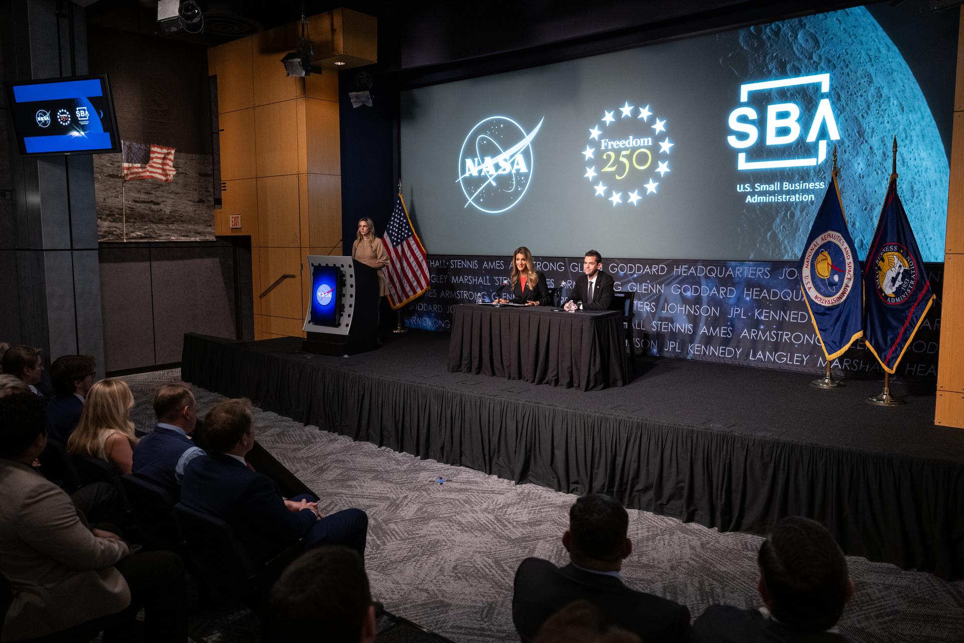 Administrator of the Small Business Administration Kelly Loeffler, left, delivers remarks alongside NASA Administrator Jared Isaacman, right, during a Memorandum of Agreement signing ceremony Monday, June 29, 2026, at the Mary W. Jackson NASA Headquarters building in Washington. This Memorandum of Agreement will provide the framework for NASA and the Small Business Administration Office of Investment and Innovation to support the growth of the Small Business Investment Company-NASA Initiative. Photo Credit: (NASA/Keegan Barber)