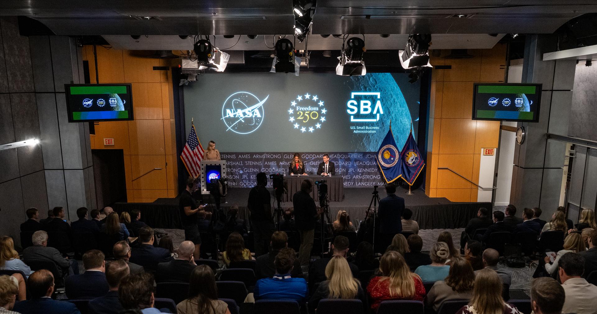 Administrator of the Small Business Administration Kelly Loeffler, left, delivers remarks alongside NASA Administrator Jared Isaacman, right, during a Memorandum of Agreement signing ceremony Monday, June 29, 2026, at the Mary W. Jackson NASA Headquarters building in Washington. This Memorandum of Agreement will provide the framework for NASA and the Small Business Administration Office of Investment and Innovation to support the growth of the Small Business Investment Company-NASA Initiative. Photo Credit: (NASA/Keegan Barber)