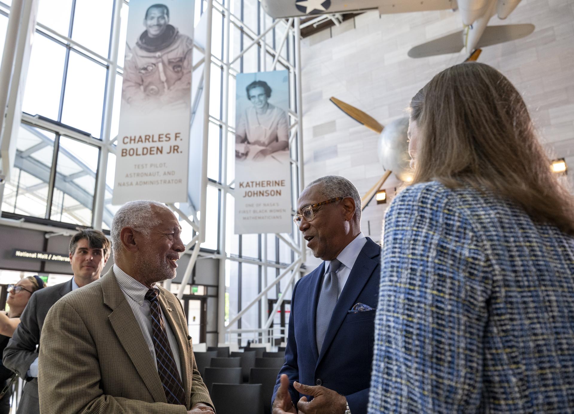 Former NASA Administrator Charles Bolden, left, speaks with guests following the Smithsonian’s National Air and Space Museum rededication ceremony Wednesday, July 1, 2026, in Washington. Photo Credit: (NASA/Keegan Barber)