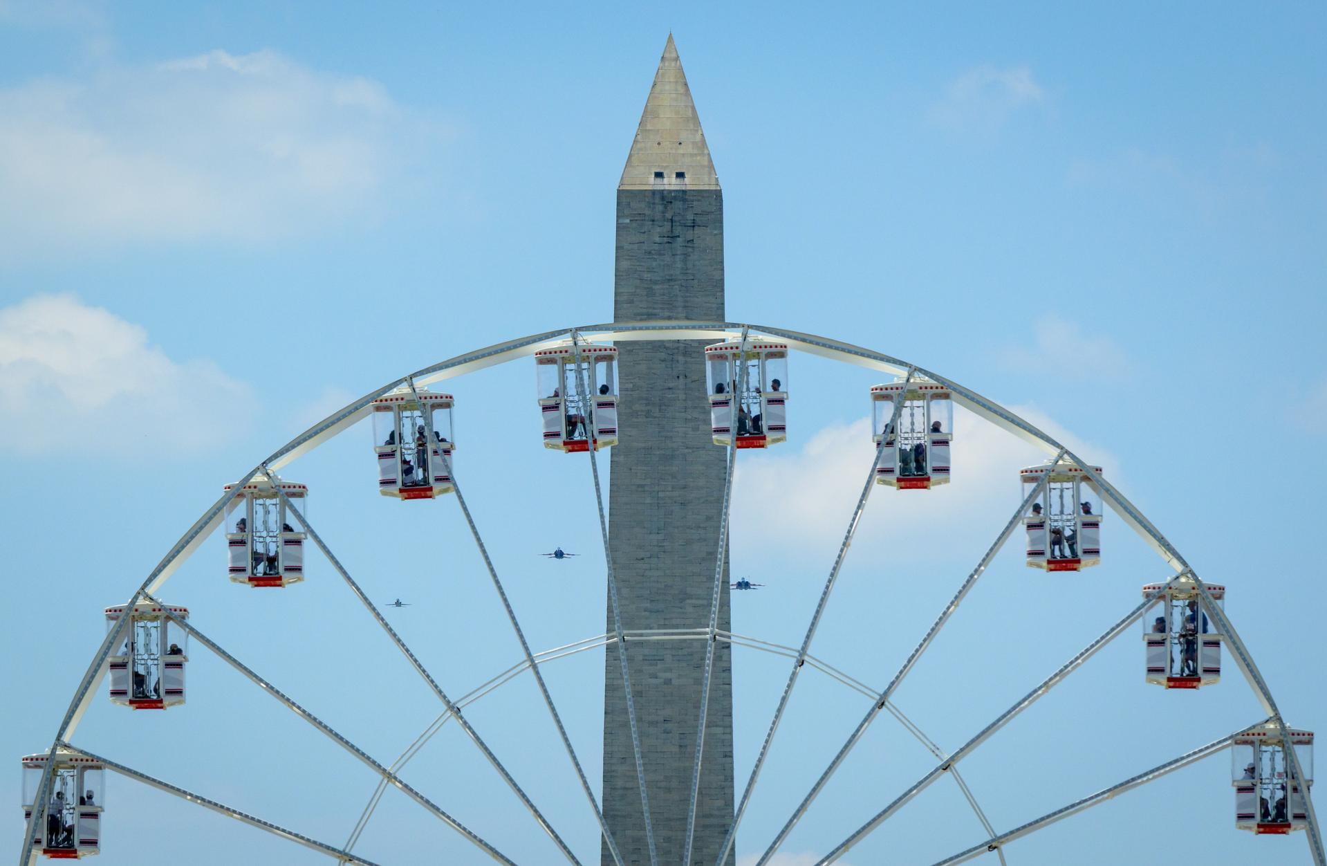 NASA’s T-38 Talon, left, F/A-18 Hornet and F-15 Eagle, right, aircraft are seen as they perform a flyover during the Great American State Fair, Saturday, July 4, 2026, on the National Mall in Washington. Photo Credit: (NASA/Bill Ingalls)