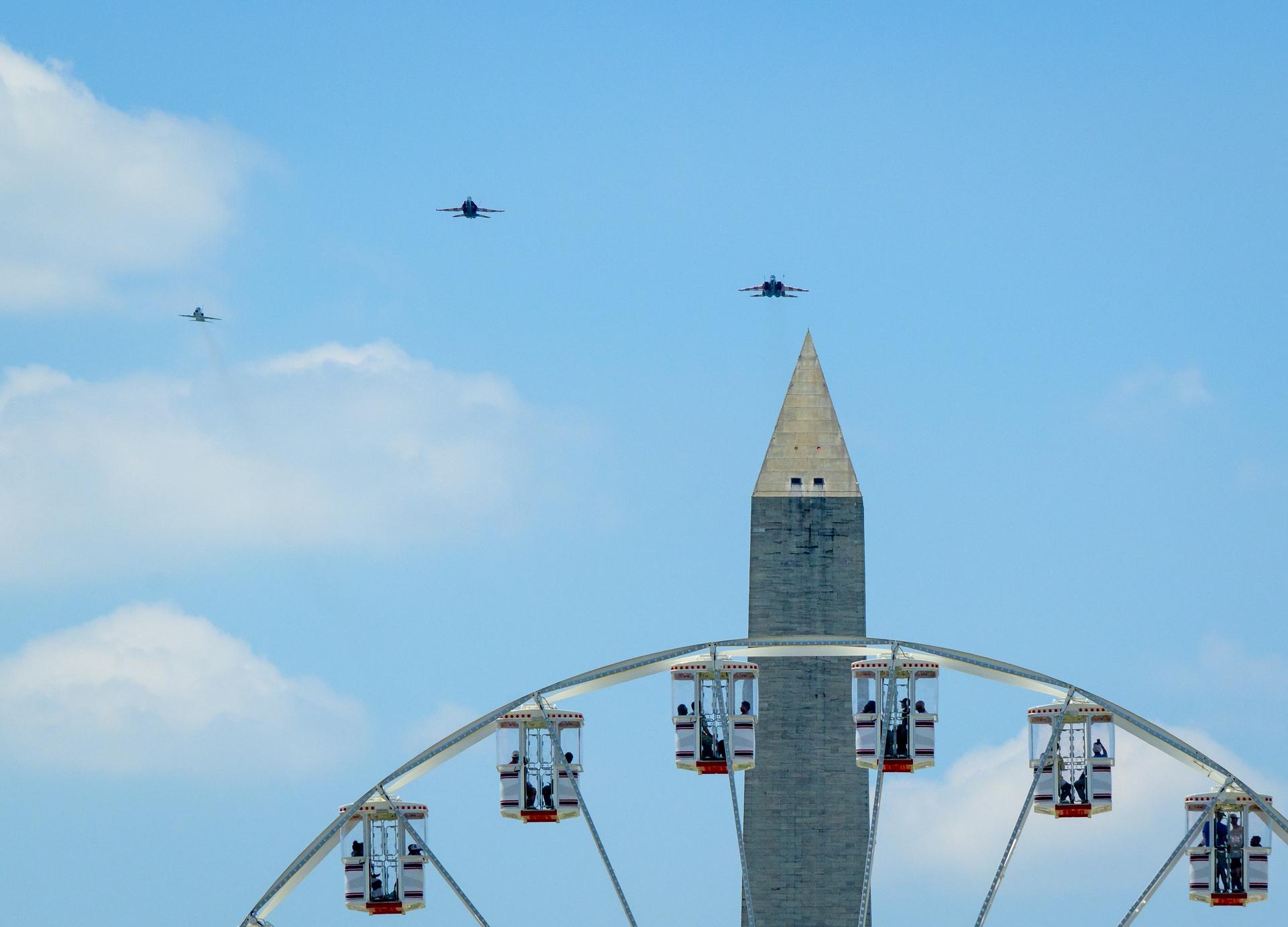 NASA’s T-38 Talon, left, F/A-18 Hornet and F-15 Eagle, right, aircraft are seen as they perform a flyover during the Great American State Fair, Saturday, July 4, 2026, on the National Mall in Washington. Photo Credit: (NASA/Bill Ingalls)