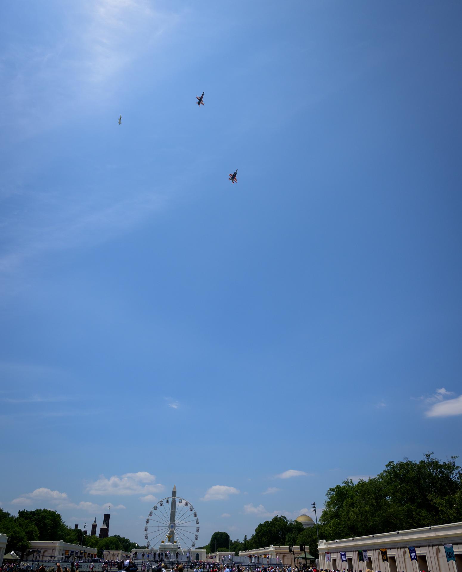 NASA’s T-38 Talon, left, F/A-18 Hornet and F-15 Eagle, right, aircraft are seen as they perform a flyover during the Great American State Fair, Saturday, July 4, 2026, on the National Mall in Washington. Photo Credit: (NASA/Bill Ingalls)