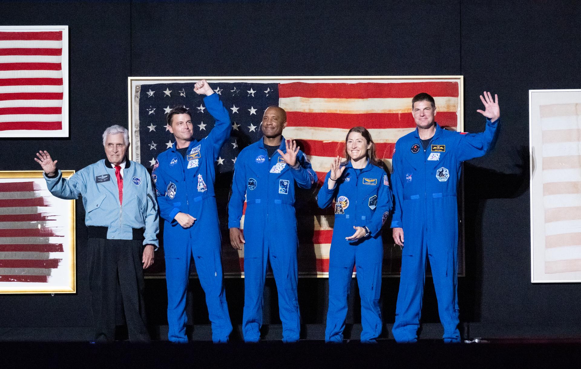 President Donald Trump recognizes NASA Apollo astronaut Harrison "Jack" Schmitt, left, NASA astronauts Reid Wiseman, commander; Victor Glover, pilot; Christina Koch, mission specialist; and CSA (Canadian Space Agency) astronaut Jeremy Hansen, mission specialist, right, during the “Salute to America” event, Saturday, July 4, 2026, on the National Mall in Washington, D.C. The United States Semiquincentennial celebrates the 250th anniversary of the adoption of the Declaration of Independence. Photo Credit: (NASA/Keegan Barber)