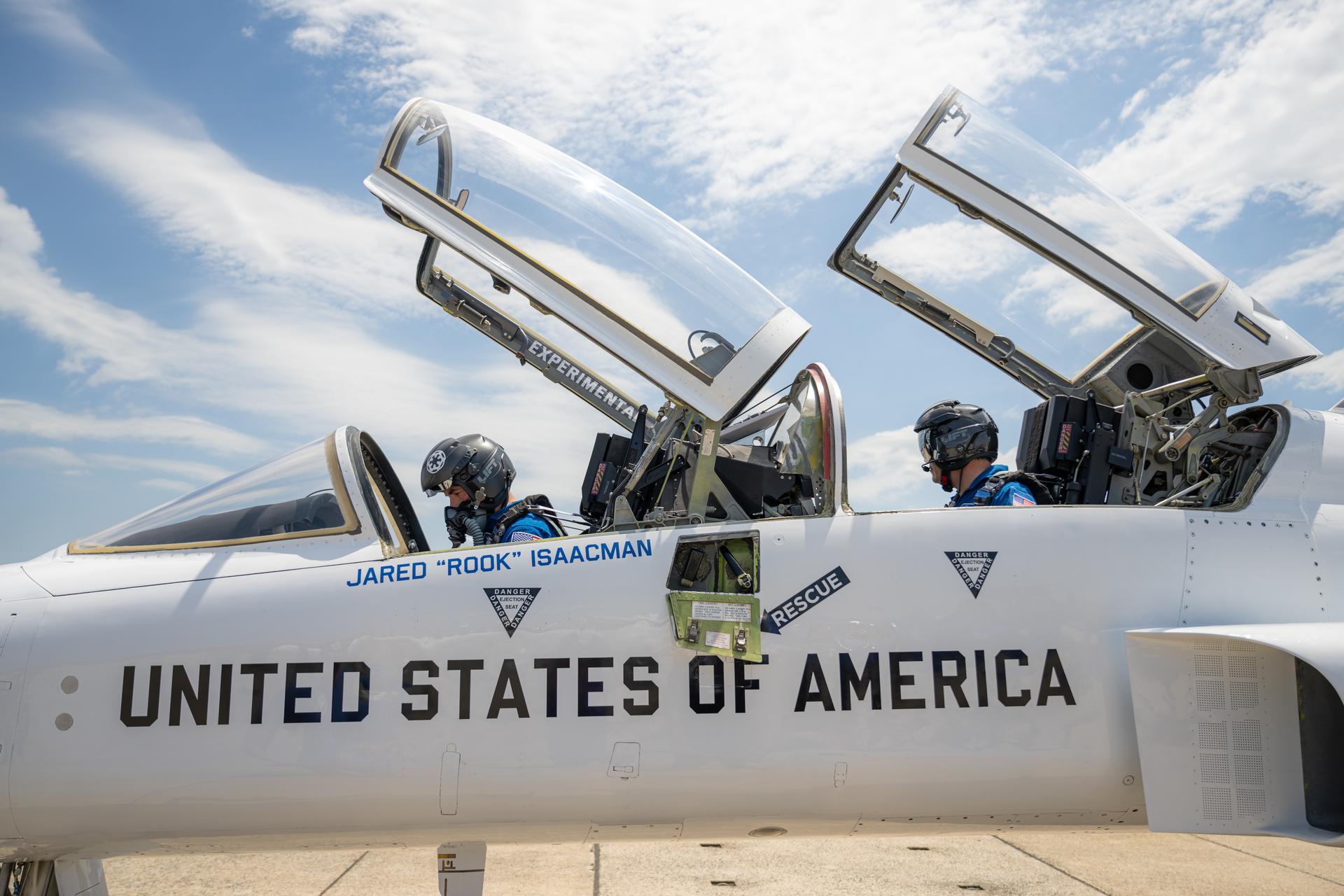 NASA Administrator Jared Isaacman, left, and Todd Blanche, Acting U.S. Attorney General, right, are seen in an F-5 aircraft, Saturday, July 4, 2026, at Joint Base Andrews in Prince George's County, Maryland. NASA aircraft conducted flyovers during the Great American State Fair in Washington, D.C. Photo Credit: (NASA/John Kraus)