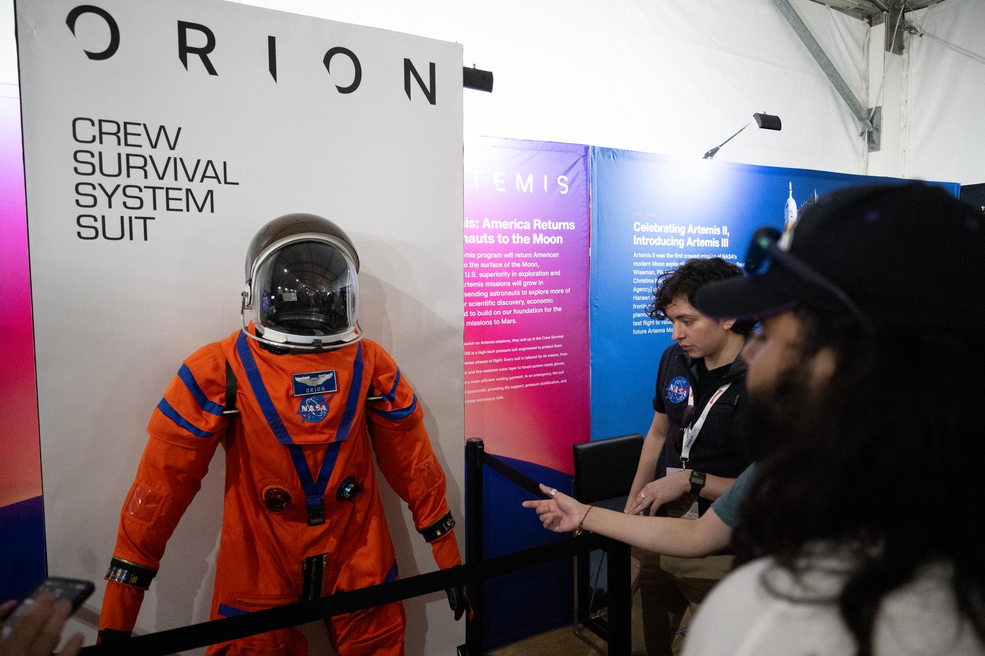 Visitors to the Great American State Fair are seen as they view NASA exhibits in the American Innovation Pavilion, Wednesday, July 8, 2026, on the National Mall in Washington, D.C. Photo Credit: (NASA/Joel Kowsky)