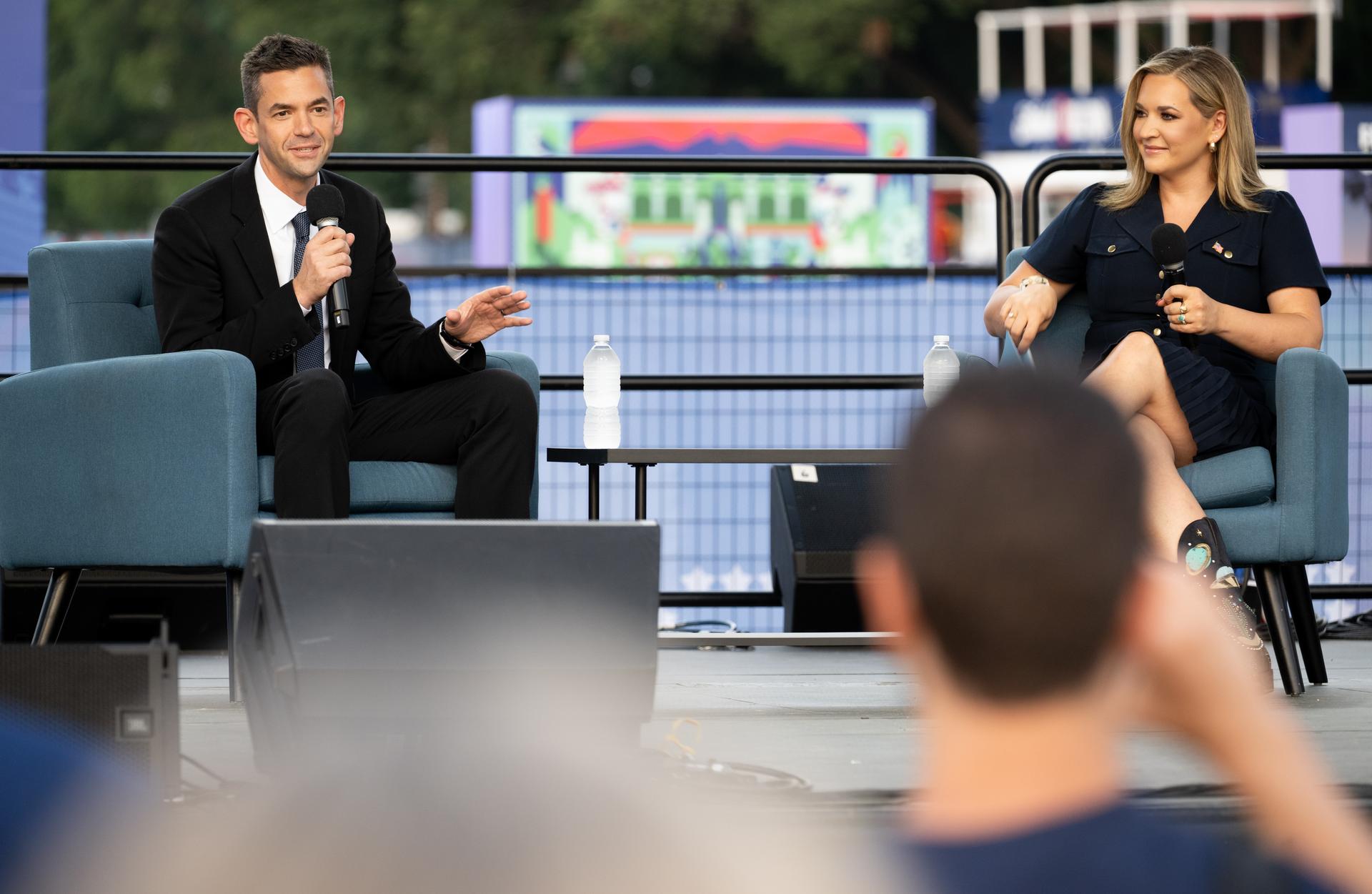 NASA Administrator Jared Isaacman, left, is seen in conversation with Katie Pavlich about the past, present, and future of space exploration on the Freedom Stage at the Great American State Fair, Wednesday, July 8, 2026, on the National Mall in Washington, D.C.  Photo Credit: (NASA/Joel Kowsky)