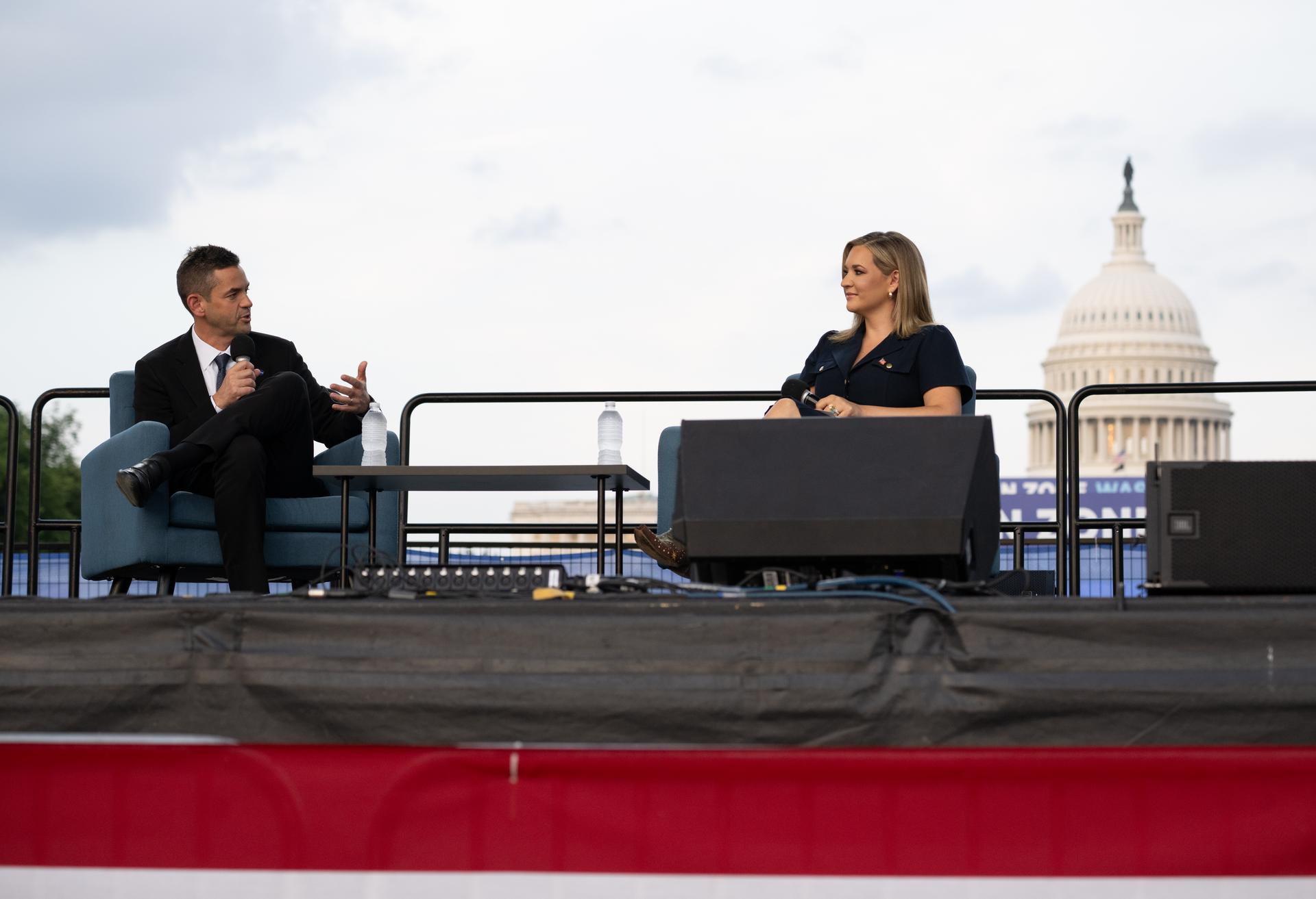 NASA Administrator Jared Isaacman, left, is seen in conversation with Katie Pavlich about the past, present, and future of space exploration on the Freedom Stage at the Great American State Fair, Wednesday, July 8, 2026, on the National Mall in Washington, D.C.  Photo Credit: (NASA/Joel Kowsky)