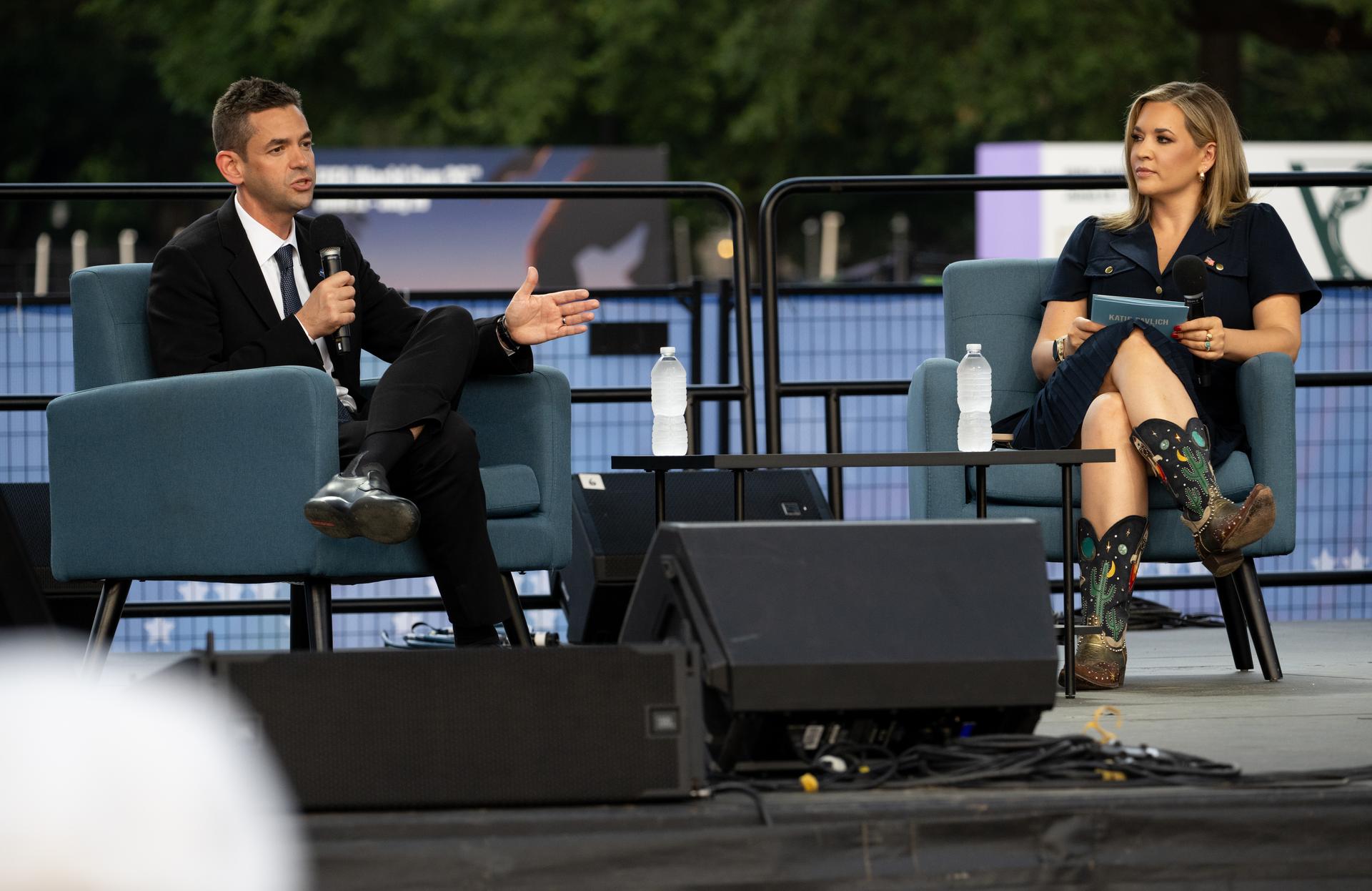 NASA Administrator Jared Isaacman, left, is seen in conversation with Katie Pavlich about the past, present, and future of space exploration on the Freedom Stage at the Great American State Fair, Wednesday, July 8, 2026, on the National Mall in Washington, D.C.  Photo Credit: (NASA/Joel Kowsky)