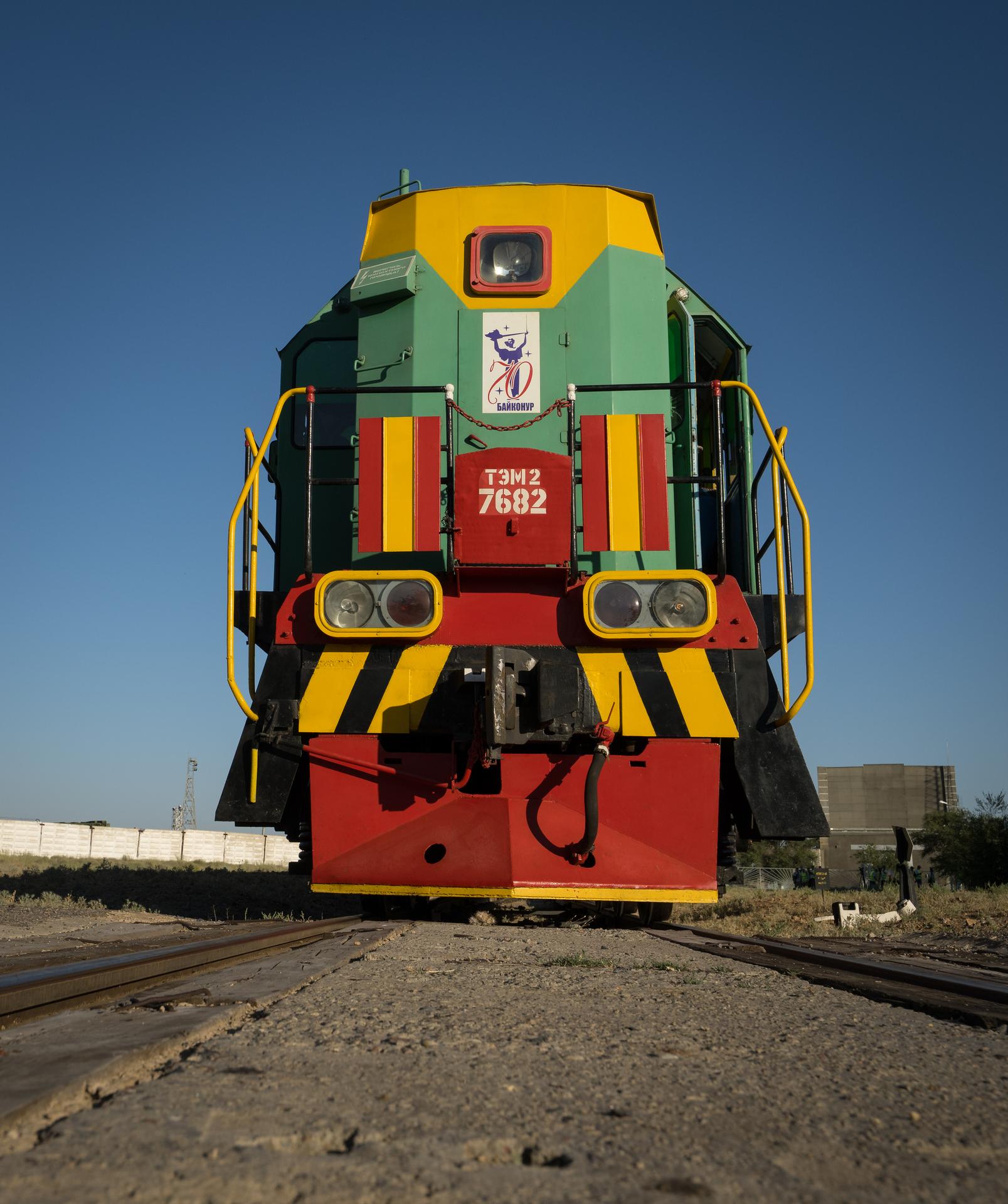 A train sits ready to support the roll out of the Soyuz rocket to the launch pad, Saturday, July 11, 2026, at Site 31 of the Baikonur Cosmodrome in Kazakhstan. Expedition 75 crewmembers: NASA astronaut Anil Menon, Roscosmos cosmonauts Pyotr Dubrov and Anna Kikina are scheduled to launch aboard their Soyuz MS-29 spacecraft on July 14. Photo Credit: (NASA/Bill Ingalls)