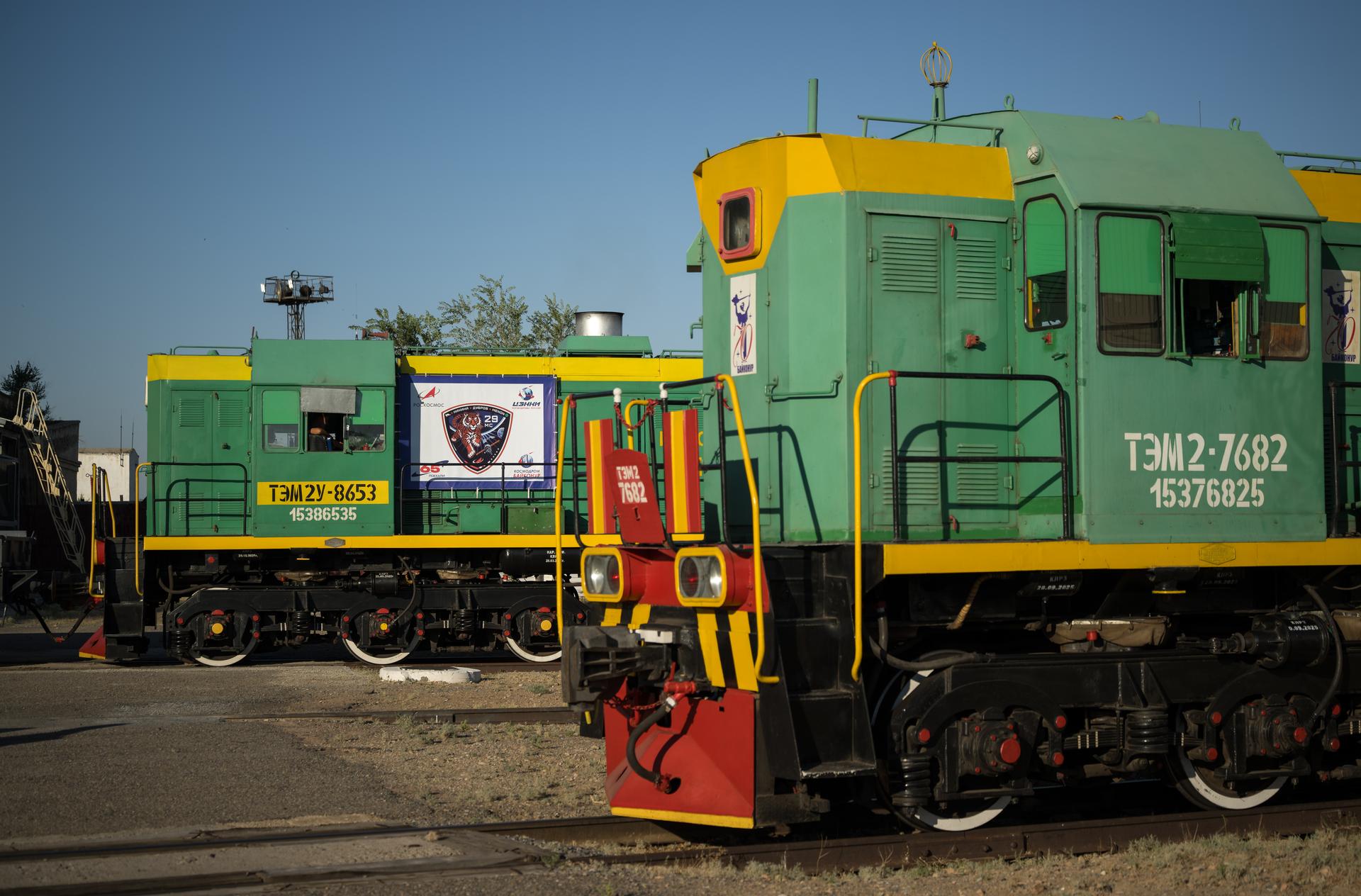 Trains sit ready to support the roll out of the Soyuz rocket to the launch pad, Saturday, July 11, 2026, at Site 31 of the Baikonur Cosmodrome in Kazakhstan. Expedition 75 crewmembers: NASA astronaut Anil Menon, Roscosmos cosmonauts Pyotr Dubrov and Anna Kikina are scheduled to launch aboard their Soyuz MS-29 spacecraft on July 14. Photo Credit: (NASA/Bill Ingalls)