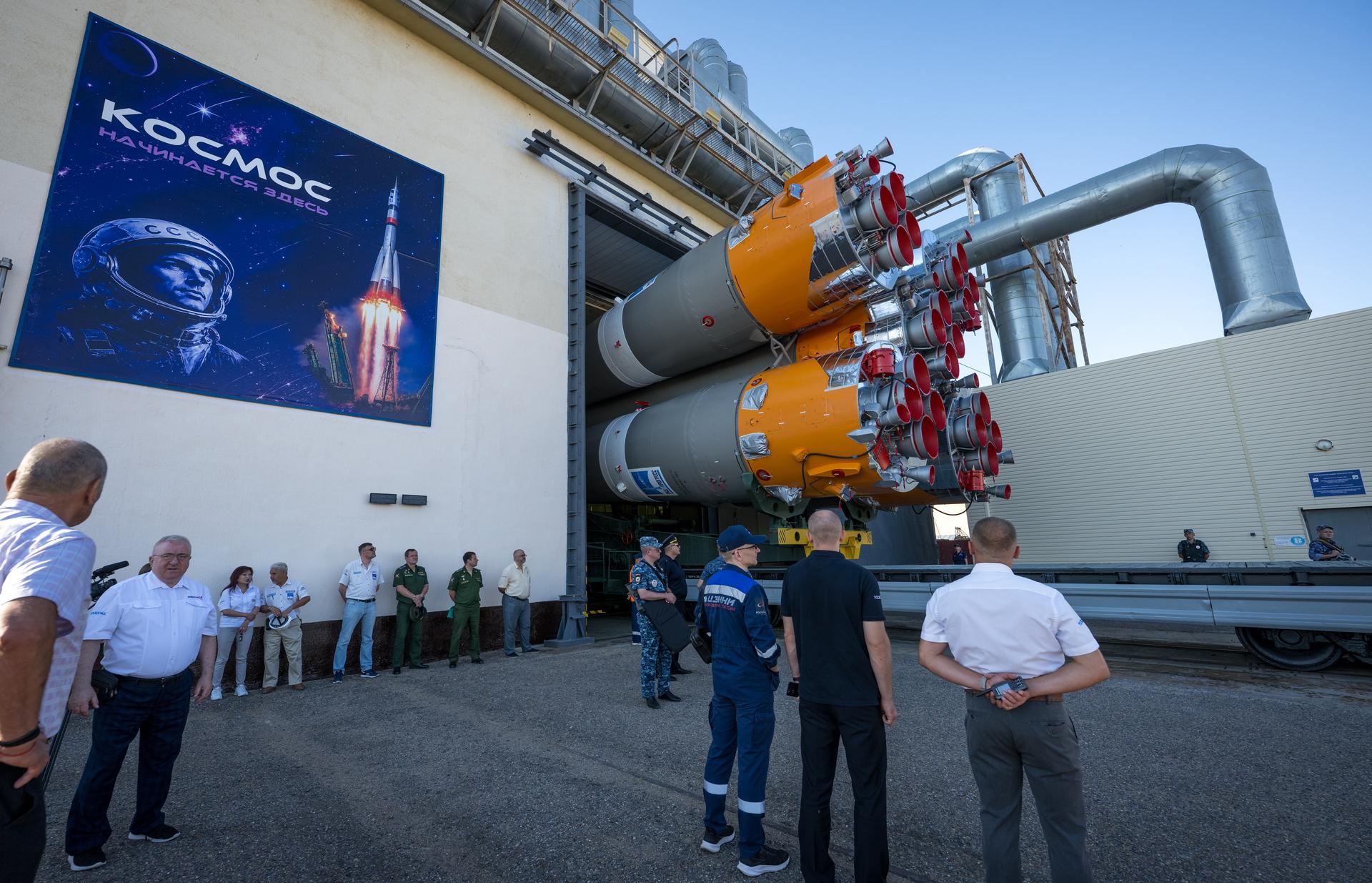 The Soyuz rocket is rolled out by train to the launch pad, Saturday, July 11, 2026, at Site 31 of the Baikonur Cosmodrome in Kazakhstan. Expedition 75 crewmembers: NASA astronaut Anil Menon, Roscosmos cosmonauts Pyotr Dubrov and Anna Kikina are scheduled to launch aboard their Soyuz MS-29 spacecraft on July 14. Photo Credit: (NASA/Bill Ingalls)