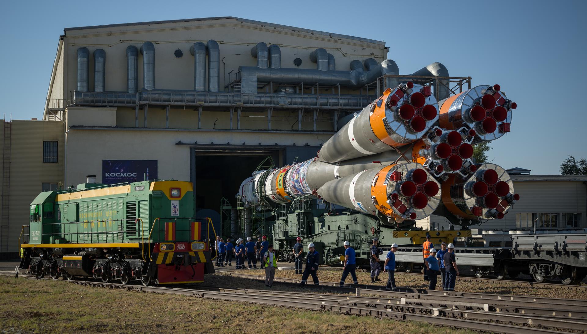 The Soyuz rocket is rolled out by train to the launch pad, Saturday, July 11, 2026, at Site 31 of the Baikonur Cosmodrome in Kazakhstan. Expedition 75 crewmembers: NASA astronaut Anil Menon, Roscosmos cosmonauts Pyotr Dubrov and Anna Kikina are scheduled to launch aboard their Soyuz MS-29 spacecraft on July 14. Photo Credit: (NASA/Bill Ingalls)