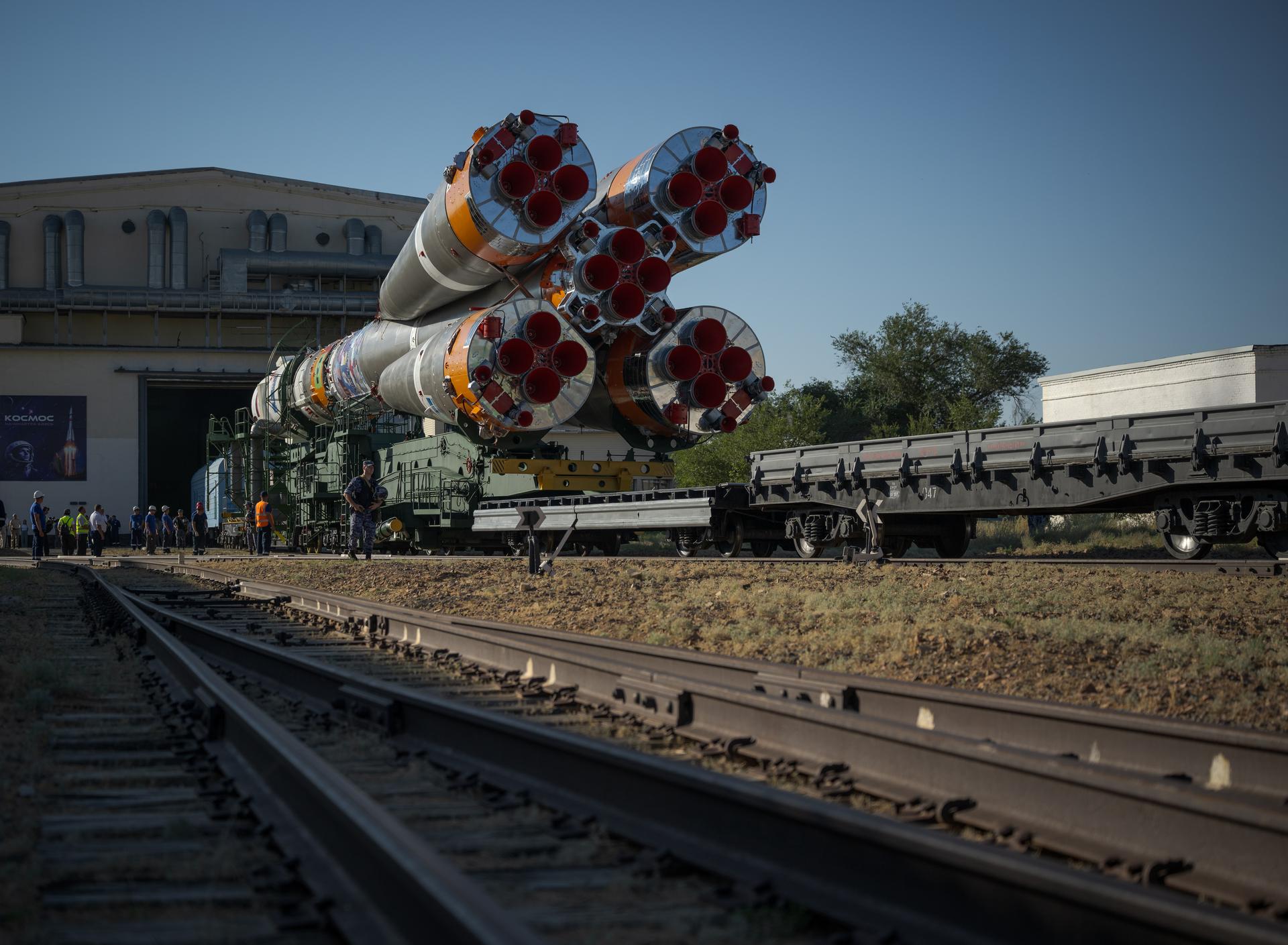 The Soyuz rocket is rolled out by train to the launch pad, Saturday, July 11, 2026, at Site 31 of the Baikonur Cosmodrome in Kazakhstan. Expedition 75 crewmembers: NASA astronaut Anil Menon, Roscosmos cosmonauts Pyotr Dubrov and Anna Kikina are scheduled to launch aboard their Soyuz MS-29 spacecraft on July 14. Photo Credit: (NASA/Bill Ingalls)