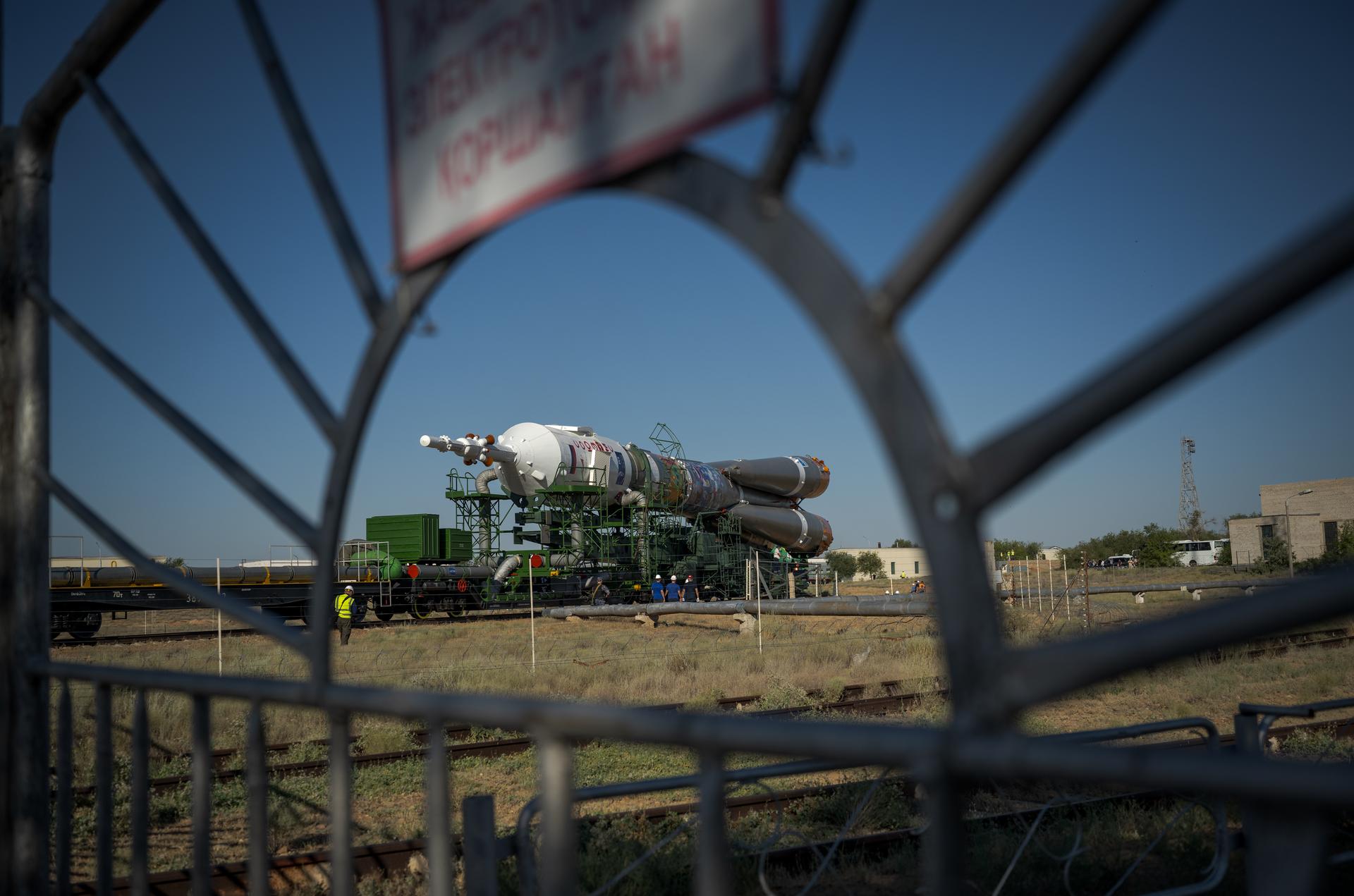The Soyuz rocket is rolled out by train to the launch pad, Saturday, July 11, 2026, at Site 31 of the Baikonur Cosmodrome in Kazakhstan. Expedition 75 crewmembers: NASA astronaut Anil Menon, Roscosmos cosmonauts Pyotr Dubrov and Anna Kikina are scheduled to launch aboard their Soyuz MS-29 spacecraft on July 14. Photo Credit: (NASA/Bill Ingalls)