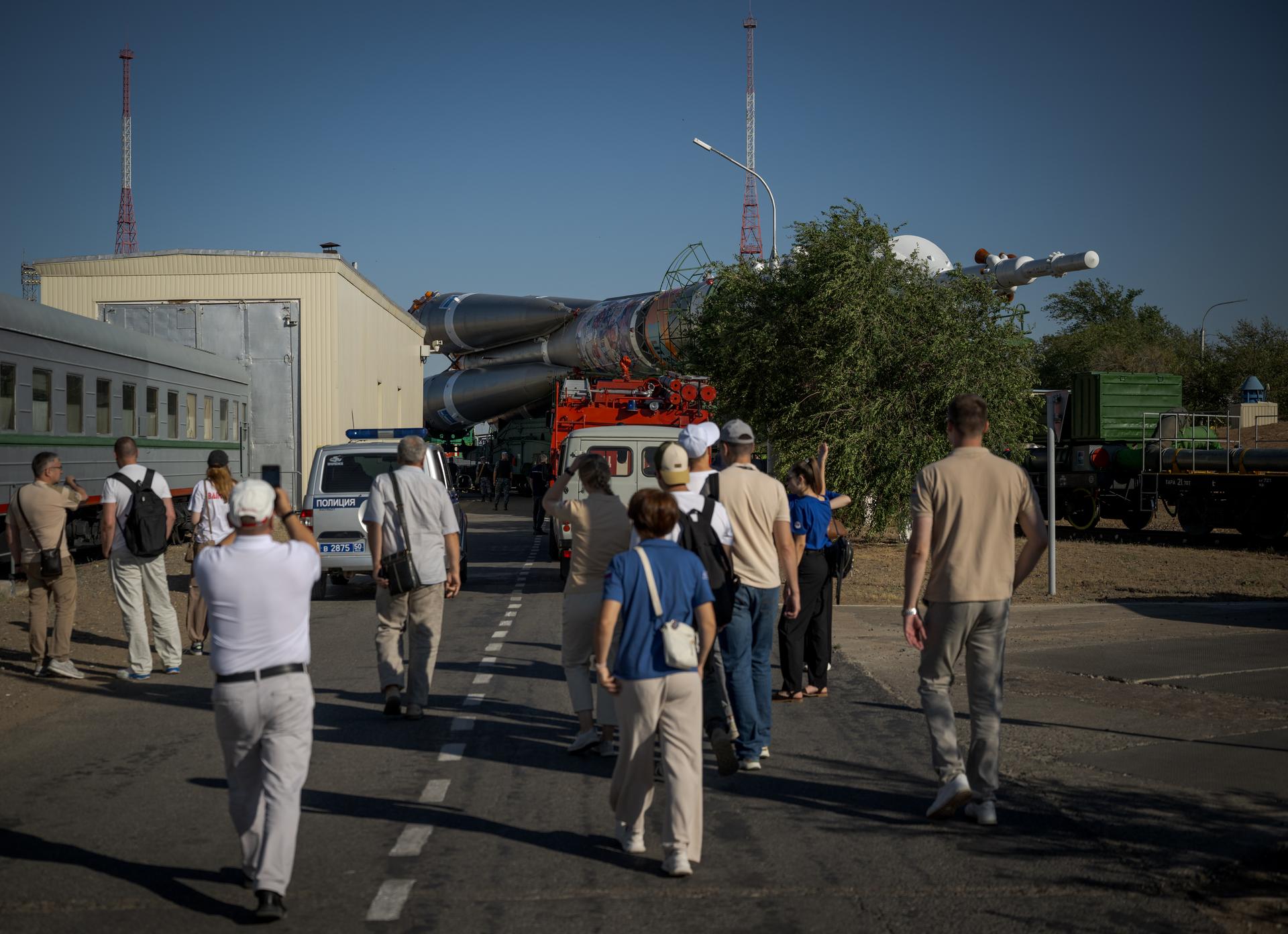 The Soyuz rocket is rolled out by train to the launch pad, Saturday, July 11, 2026, at Site 31 of the Baikonur Cosmodrome in Kazakhstan. Expedition 75 crewmembers: NASA astronaut Anil Menon, Roscosmos cosmonauts Pyotr Dubrov and Anna Kikina are scheduled to launch aboard their Soyuz MS-29 spacecraft on July 14. Photo Credit: (NASA/Bill Ingalls)