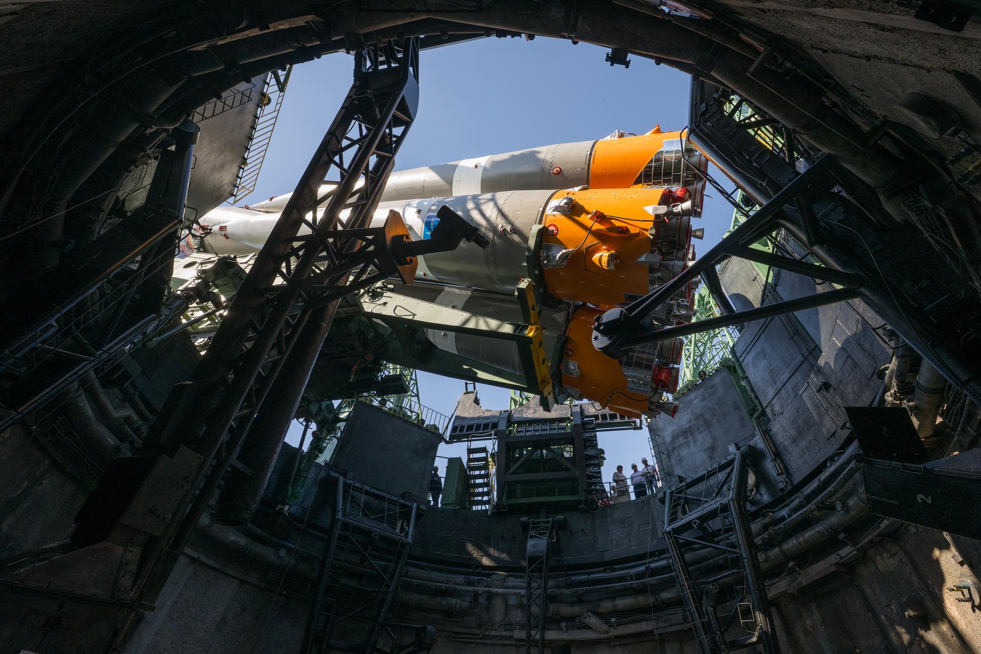The Soyuz rocket is raised into position at the Site 31 launch pad of the Baikonur Cosmodrome in Kazakhstan, Saturday, July 11, 2026. Expedition 75 crewmembers: NASA astronaut Anil Menon, Roscosmos cosmonauts Pyotr Dubrov and Anna Kikina are scheduled to launch aboard their Soyuz MS-29 spacecraft on July 14. Photo Credit: (NASA/Bill Ingalls)