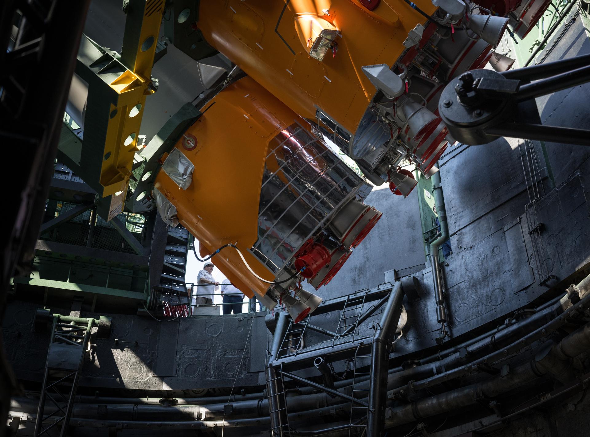 The Soyuz rocket is raised into position at the Site 31 launch pad of the Baikonur Cosmodrome in Kazakhstan, Saturday, July 11, 2026. Expedition 75 crewmembers: NASA astronaut Anil Menon, Roscosmos cosmonauts Pyotr Dubrov and Anna Kikina are scheduled to launch aboard their Soyuz MS-29 spacecraft on July 14. Photo Credit: (NASA/Bill Ingalls)