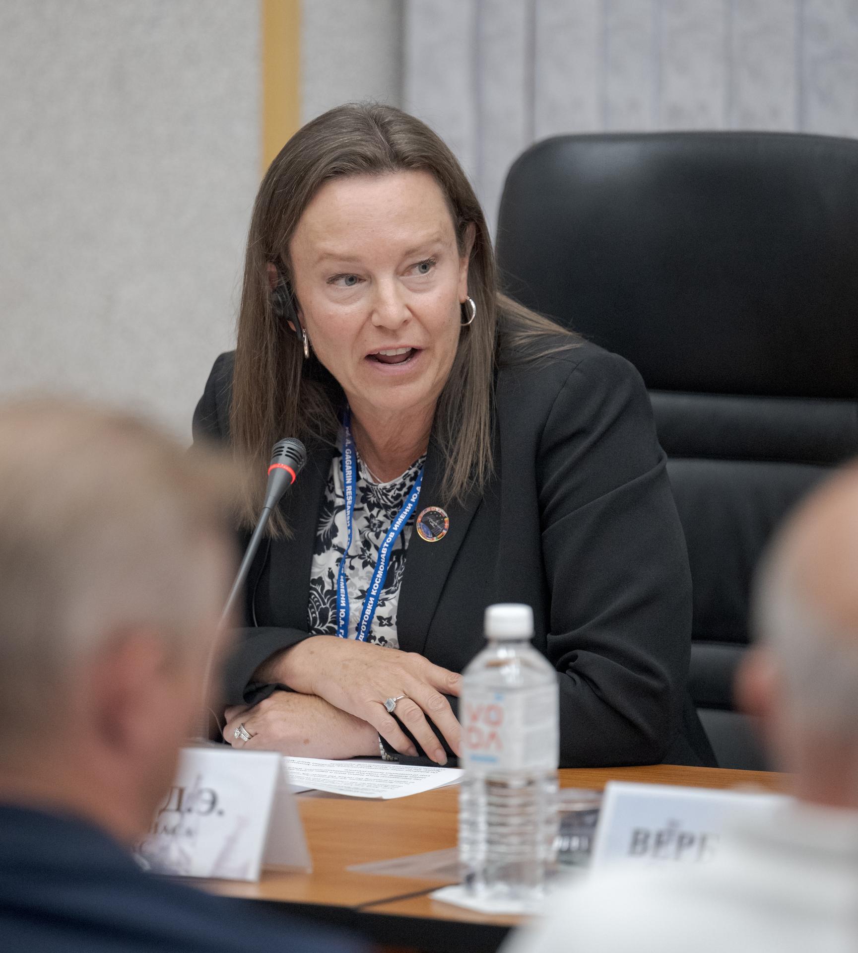 NASA International Space Station Program Deputy Manager, Dina Contella, is seen during the State Commission meeting to approve the Soyuz launch of Expedition 75 to the International Space Station, Monday, July 13, 2026 at the Cosmonaut Hotel in Baikonur, Kazakhstan. Expedition 75 crewmembers: NASA astronaut Anil Menon, Roscosmos cosmonauts Pyotr Dubrov and Anna Kikina are scheduled to launch aboard the Soyuz MS-29 spacecraft to the International Space Station on July 14. Photo Credit: (NASA/Bill Ingalls)