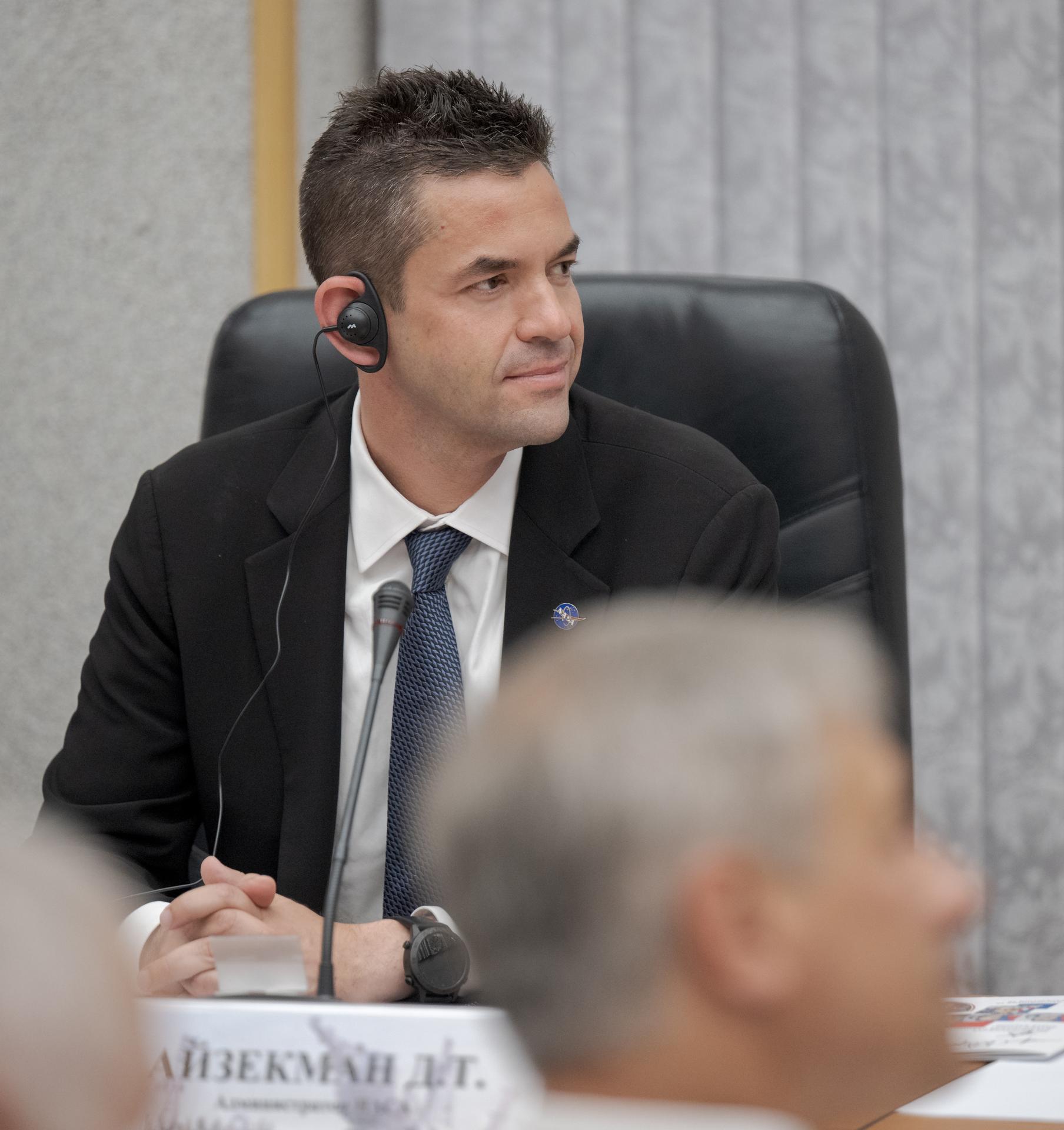 NASA Administrator Jared Isaacman is seen during the State Commission meeting to approve the Soyuz launch of Expedition 75 to the International Space Station, Monday, July 13, 2026 at the Cosmonaut Hotel in Baikonur, Kazakhstan. Expedition 75 crewmembers: NASA astronaut Anil Menon, Roscosmos cosmonauts Pyotr Dubrov and Anna Kikina are scheduled to launch aboard the Soyuz MS-29 spacecraft to the International Space Station on July 14. Photo Credit: (NASA/Bill Ingalls)
