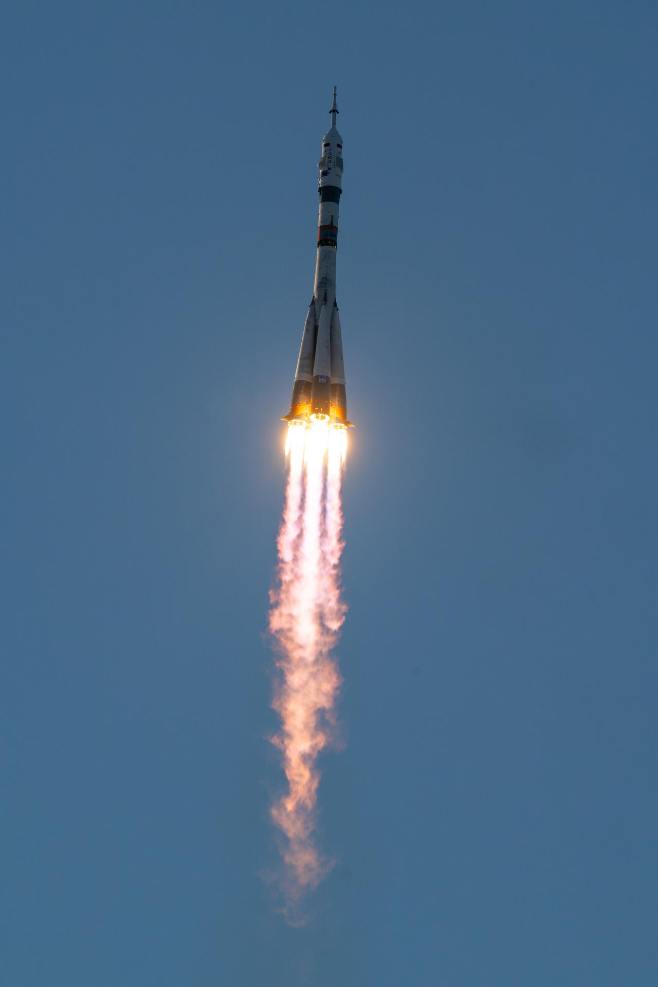 The Soyuz rocket launches to the International Space Station with Expedition 75 crewmembers: NASA astronaut Anil Menon, Roscosmos cosmonauts Pyotr Dubrov, and Anna Kikina onboard, Tuesday, July 14, 2026, at the Baikonur Cosmodrome in Kazakhstan. Photo Credit: (NASA/Bill Ingalls)